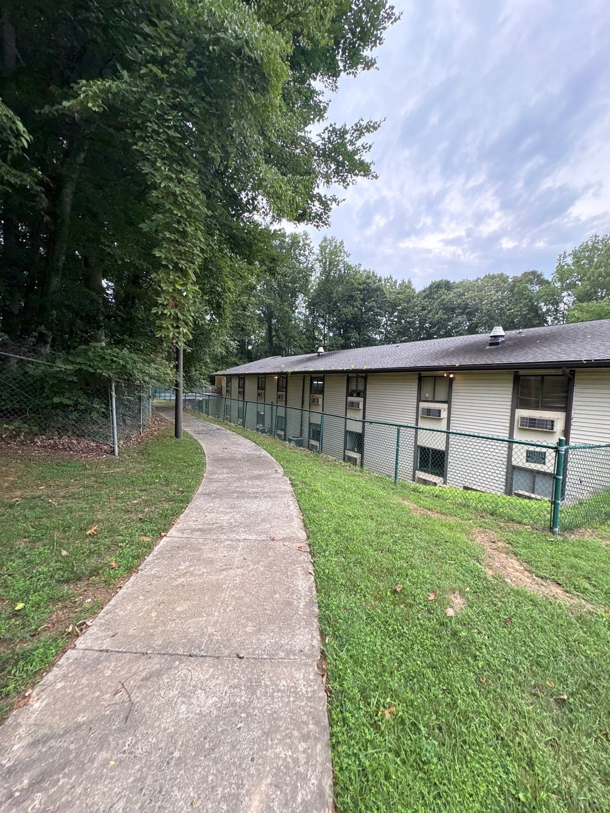 Exterior building washing and cleaning of siding and entryway