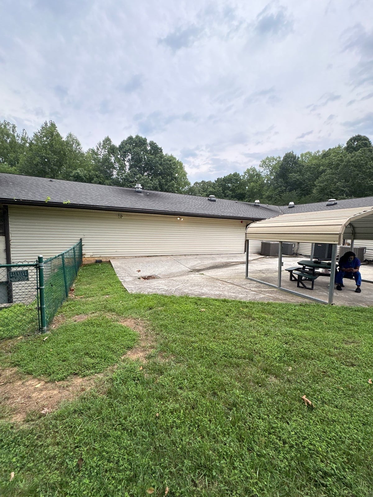 Exterior building washing and cleaning of siding and entryway