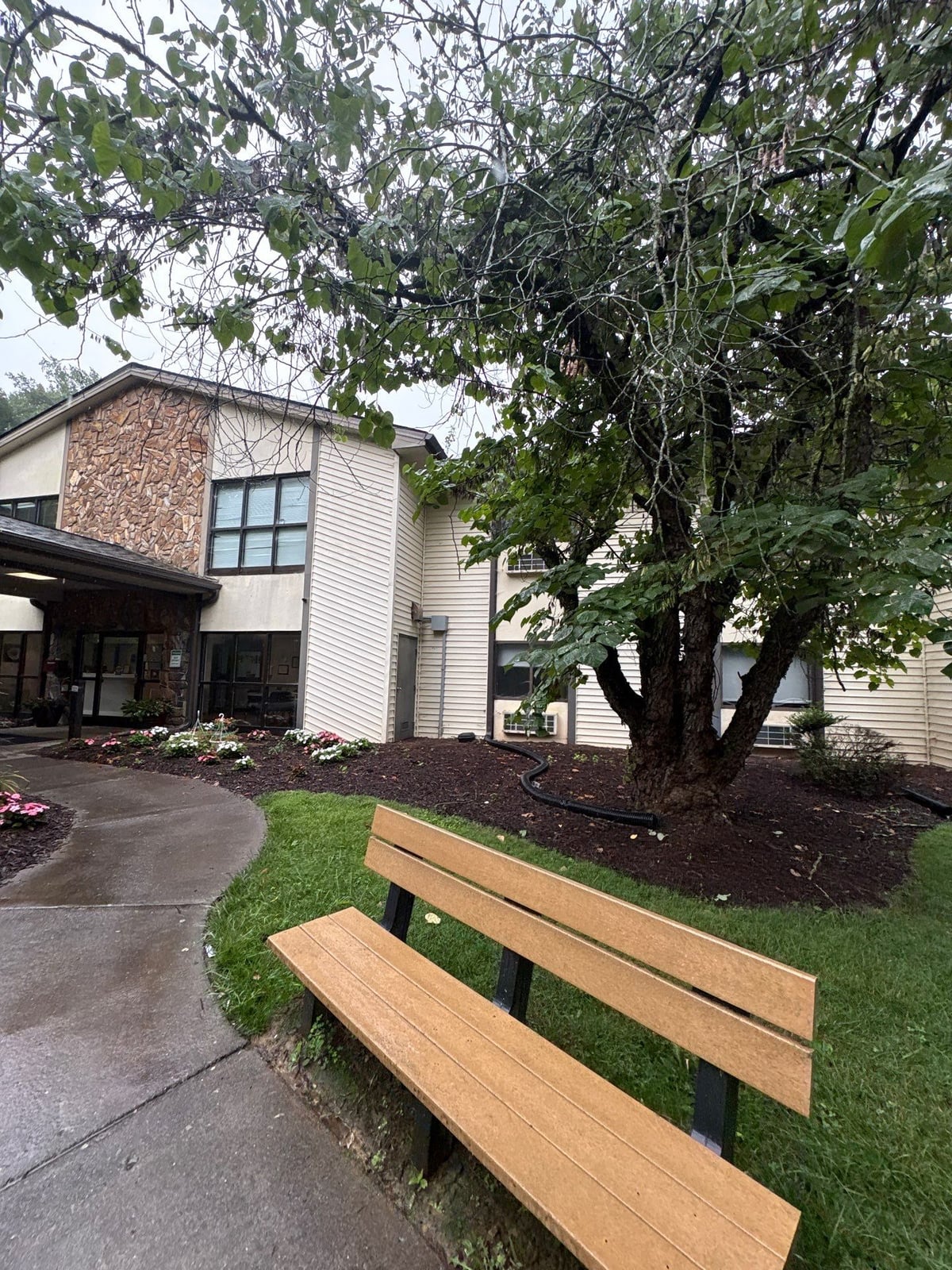 Exterior building washing and cleaning of siding and entryway