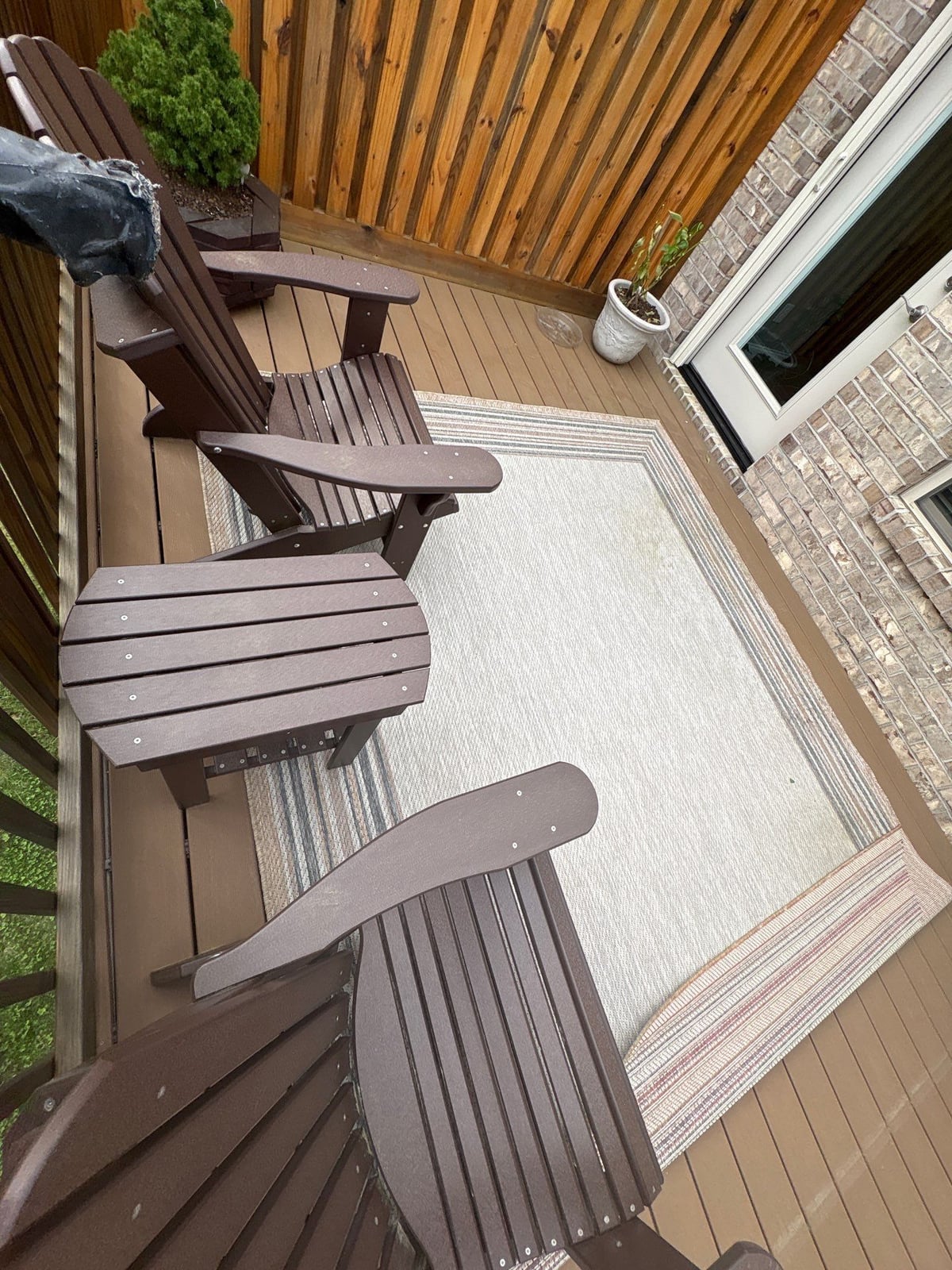 Exterior brick wall and garage door pressure washing