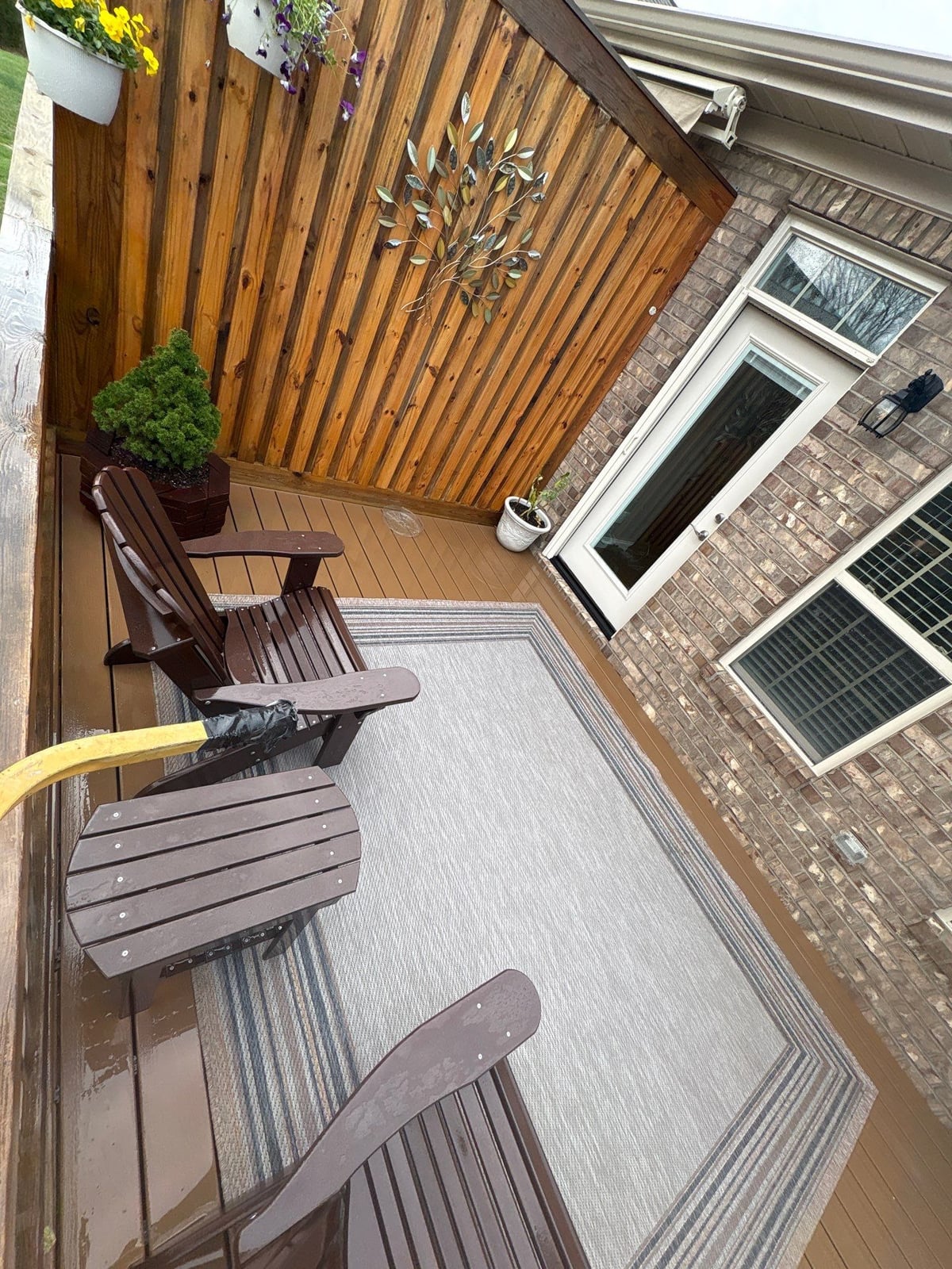Exterior brick wall and garage door pressure washing
