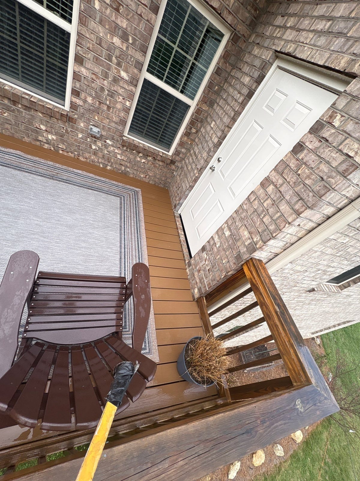 Exterior brick wall and garage door pressure washing