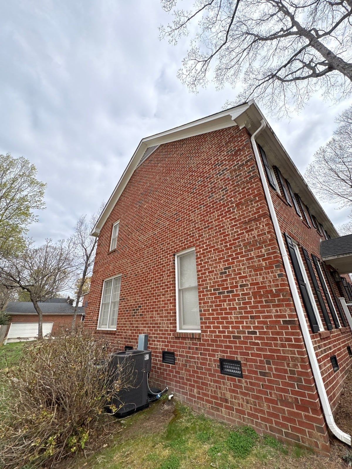 Exterior soft washing of brick siding and trim