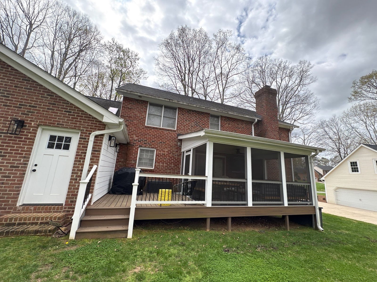 Exterior soft washing of brick siding and trim