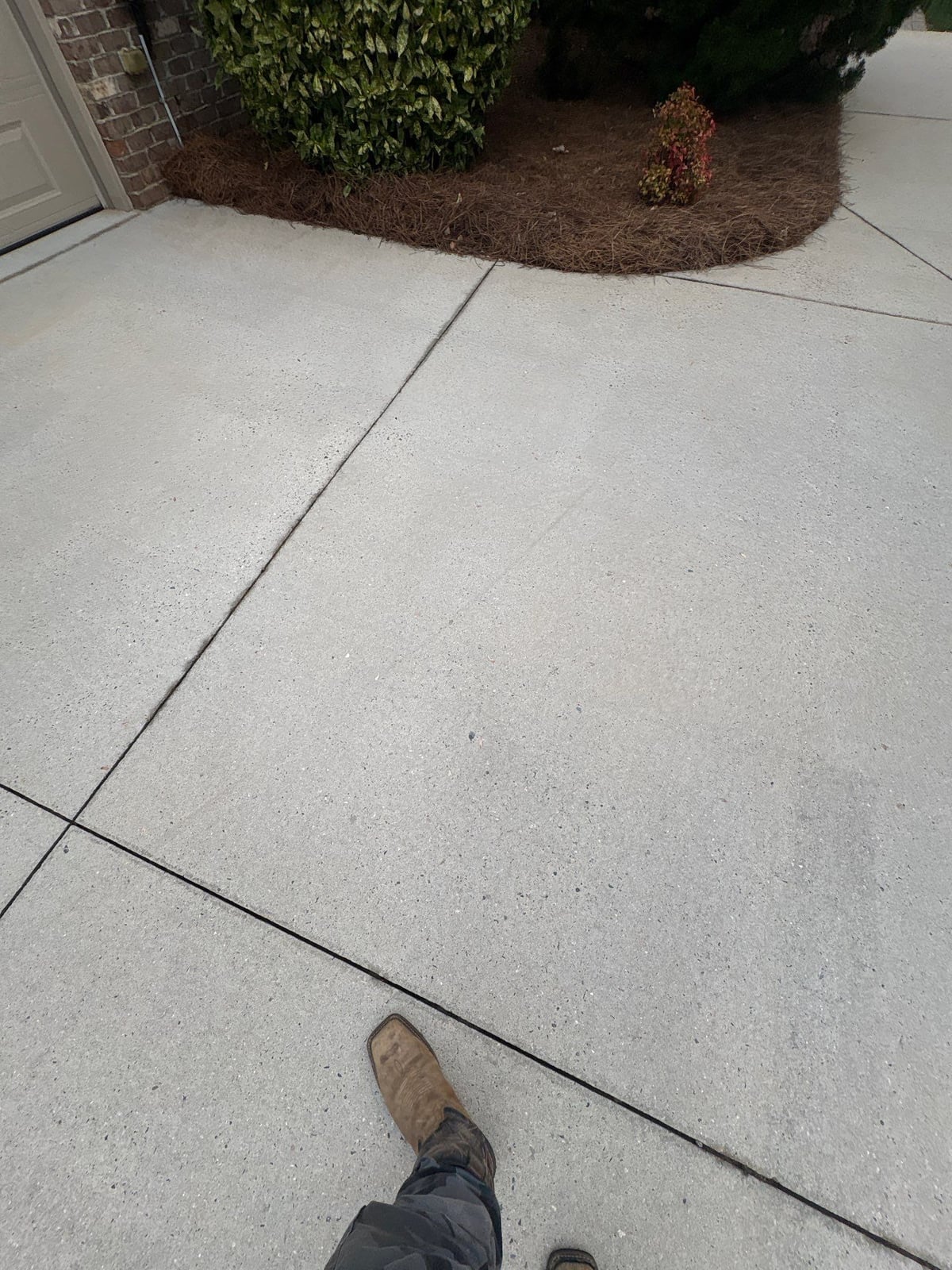 Driveway pressure washing and outdoor patio furniture cleaning