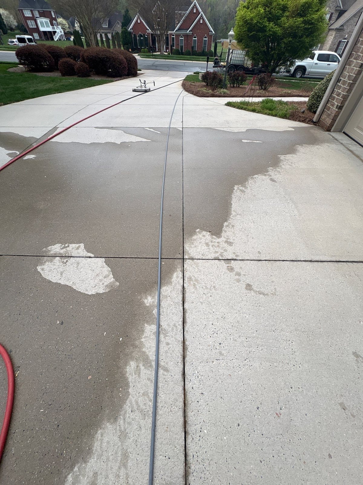 Driveway pressure washing and outdoor patio furniture cleaning