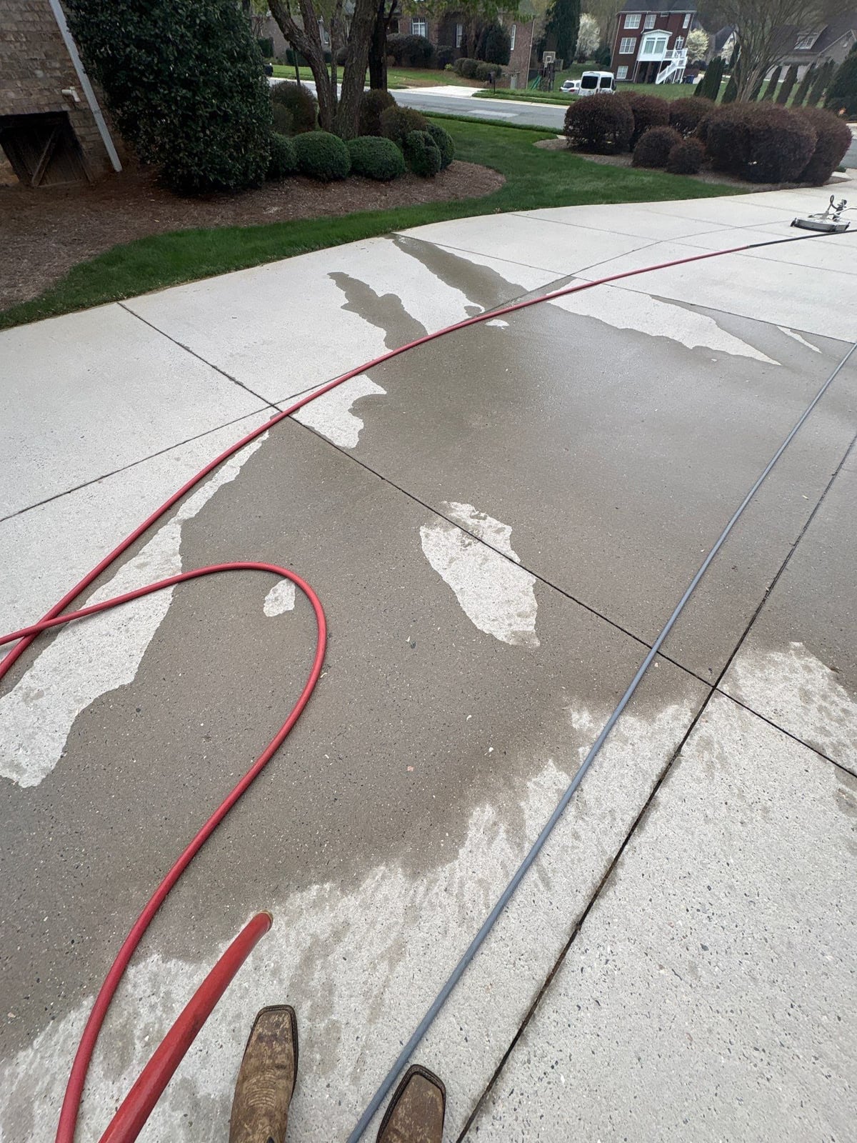 Driveway pressure washing and outdoor patio furniture cleaning