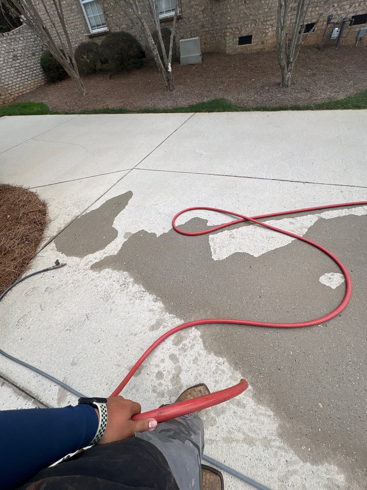 Driveway pressure washing and outdoor patio furniture cleaning