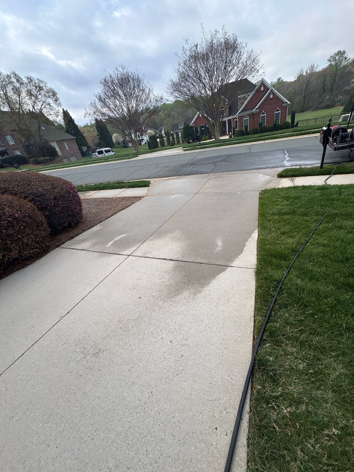 Driveway pressure washing and outdoor patio furniture cleaning
