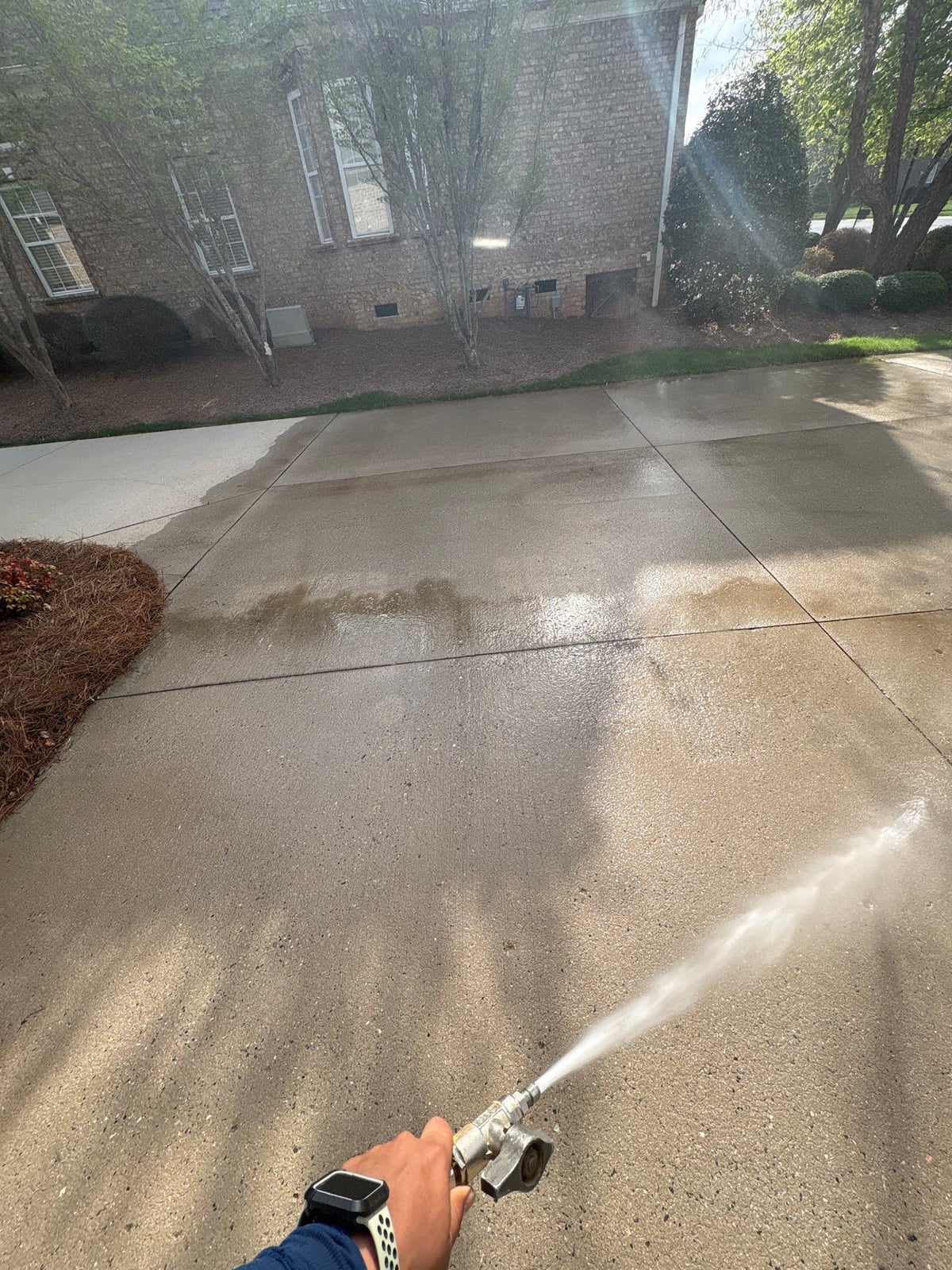 Driveway pressure washing and outdoor patio furniture cleaning