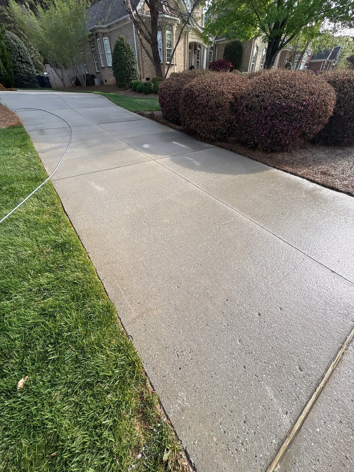 Driveway pressure washing and outdoor patio furniture cleaning