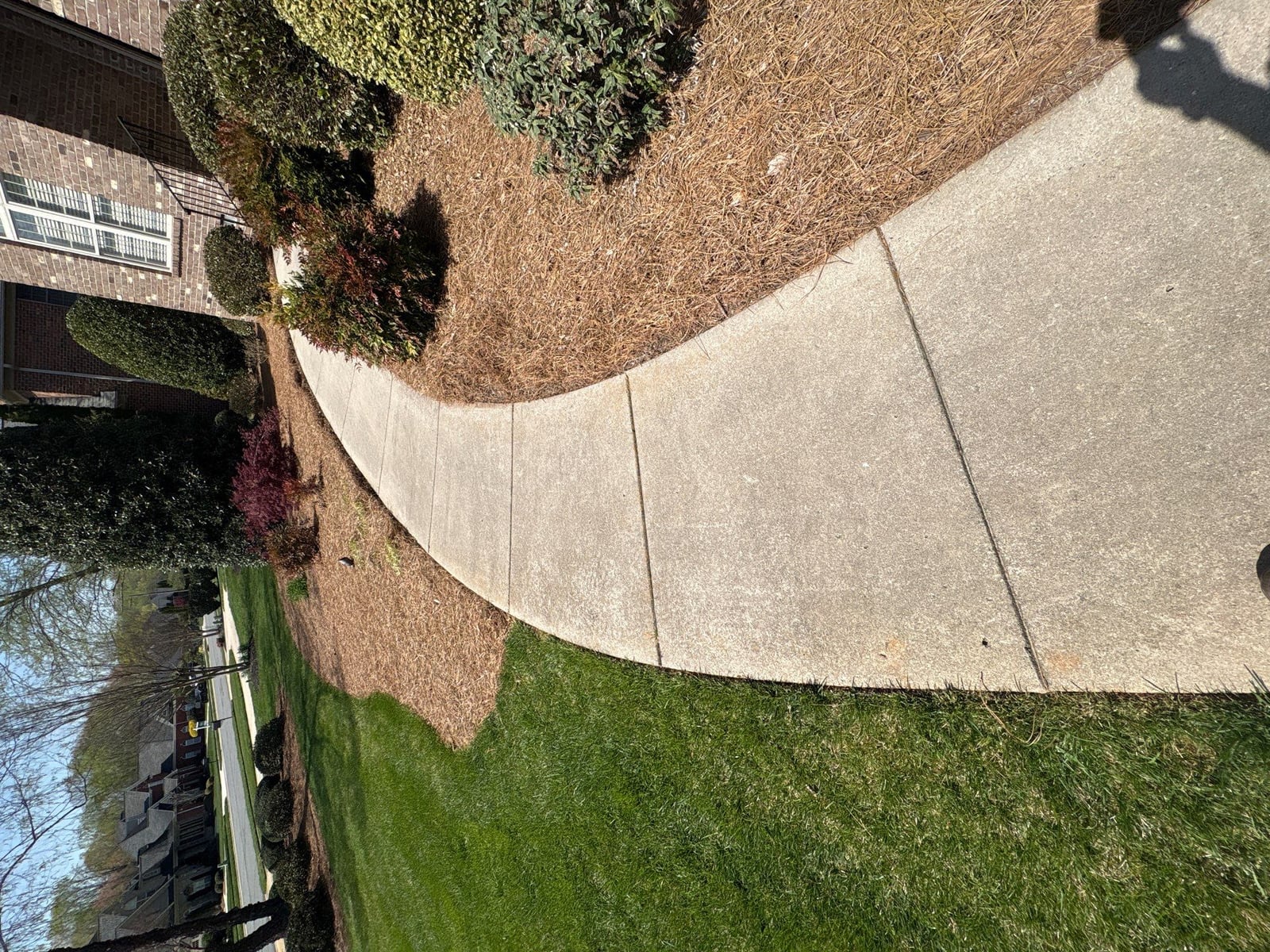 Driveway pressure washing and outdoor patio furniture cleaning