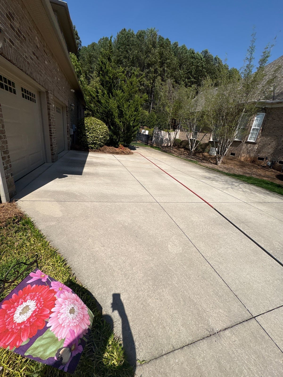 Driveway pressure washing and outdoor patio furniture cleaning
