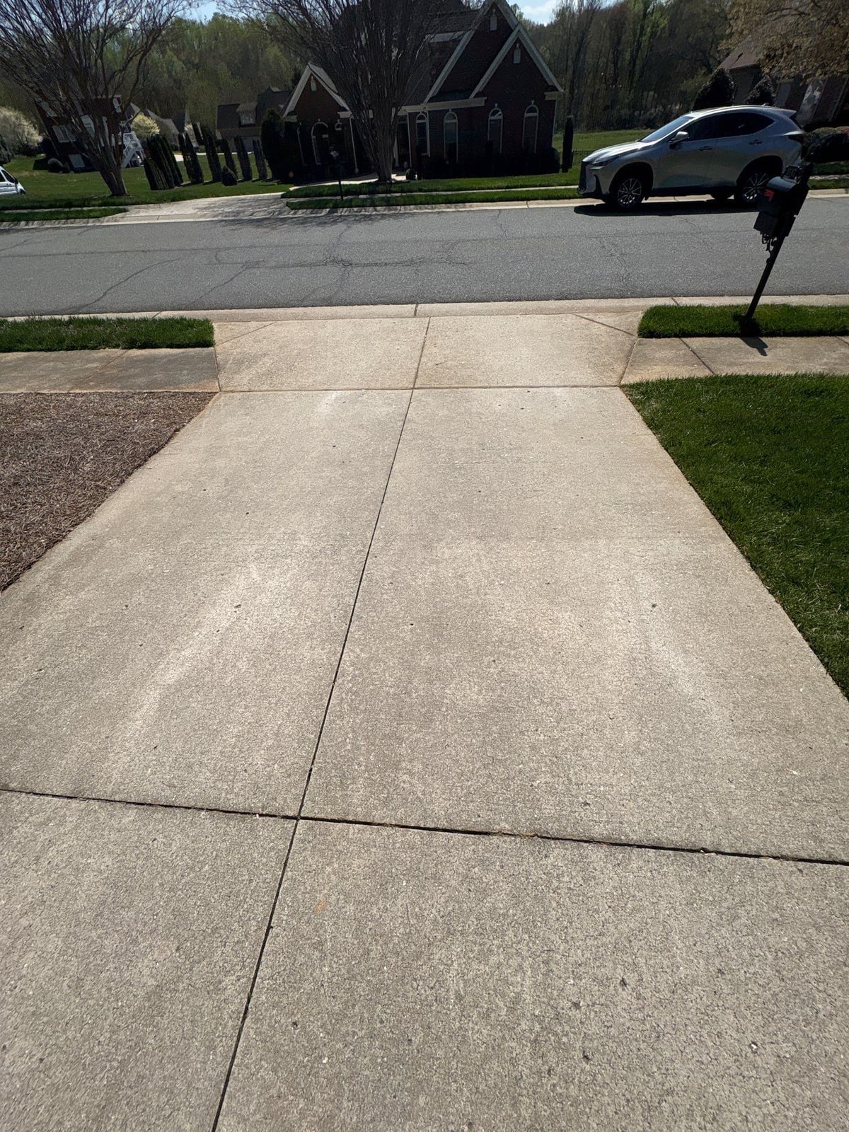 Driveway pressure washing and outdoor patio furniture cleaning