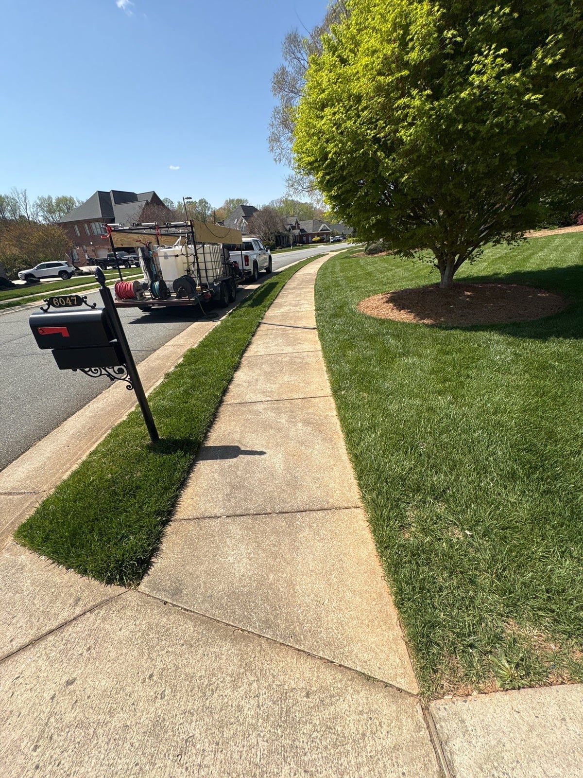 Driveway pressure washing and outdoor patio furniture cleaning