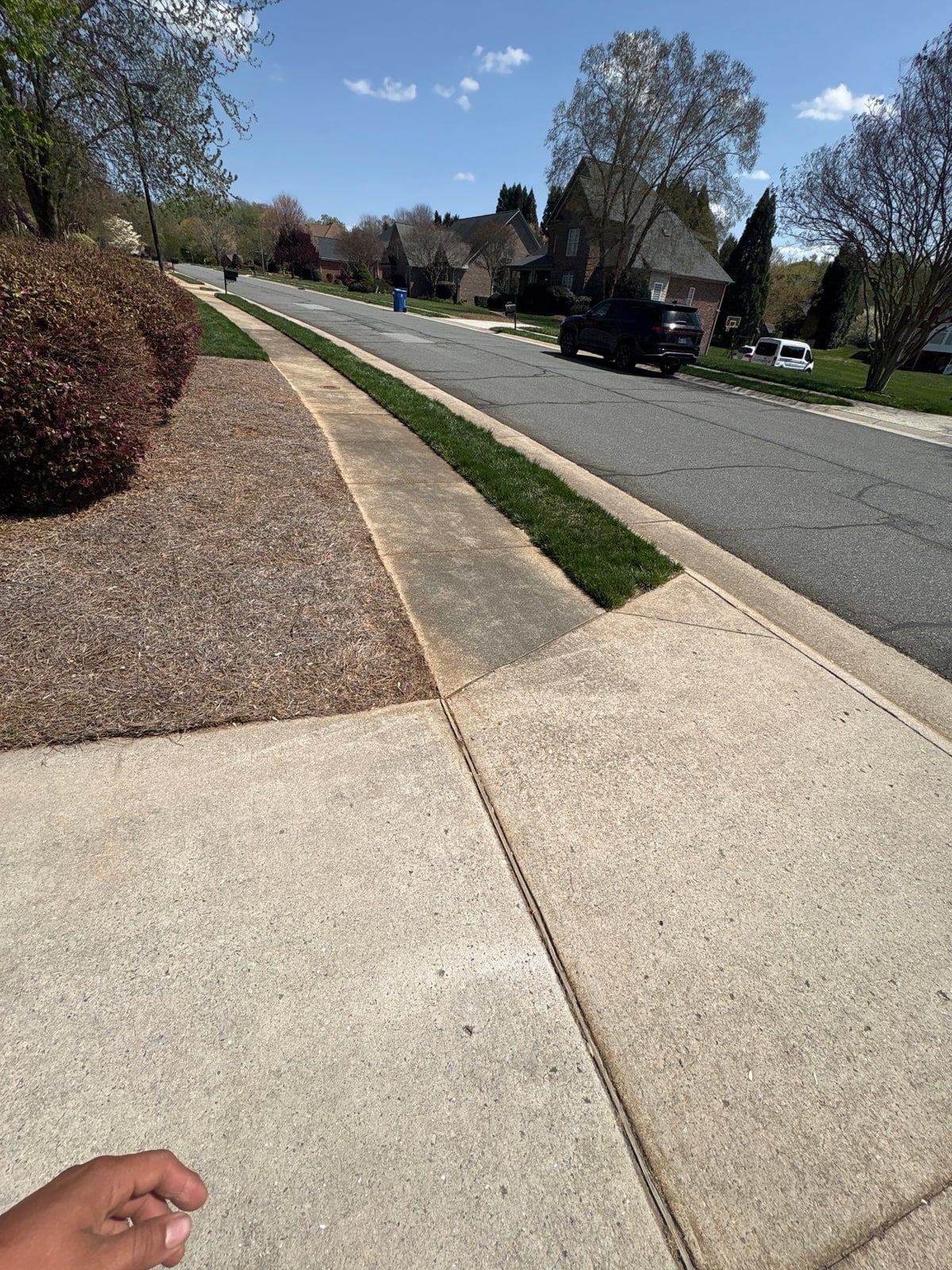 Driveway pressure washing and outdoor patio furniture cleaning