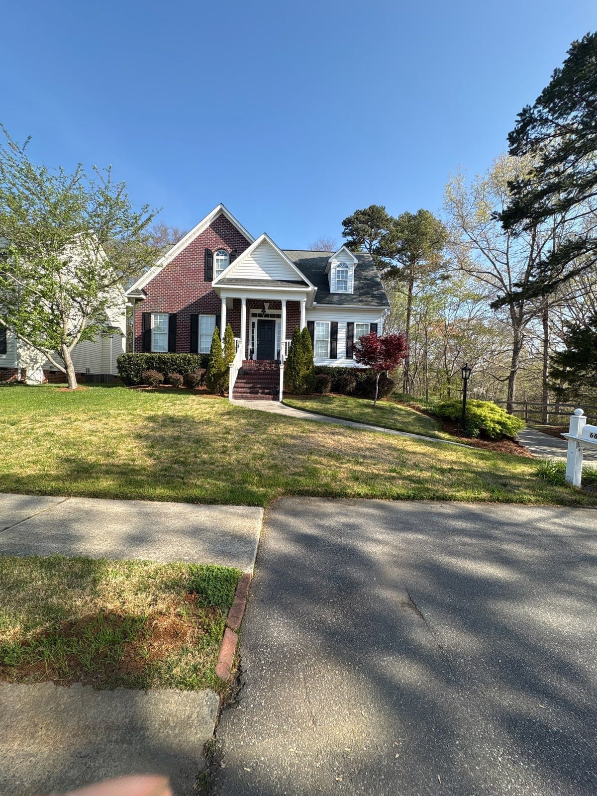 Exterior soft washing of siding and wood deck railings