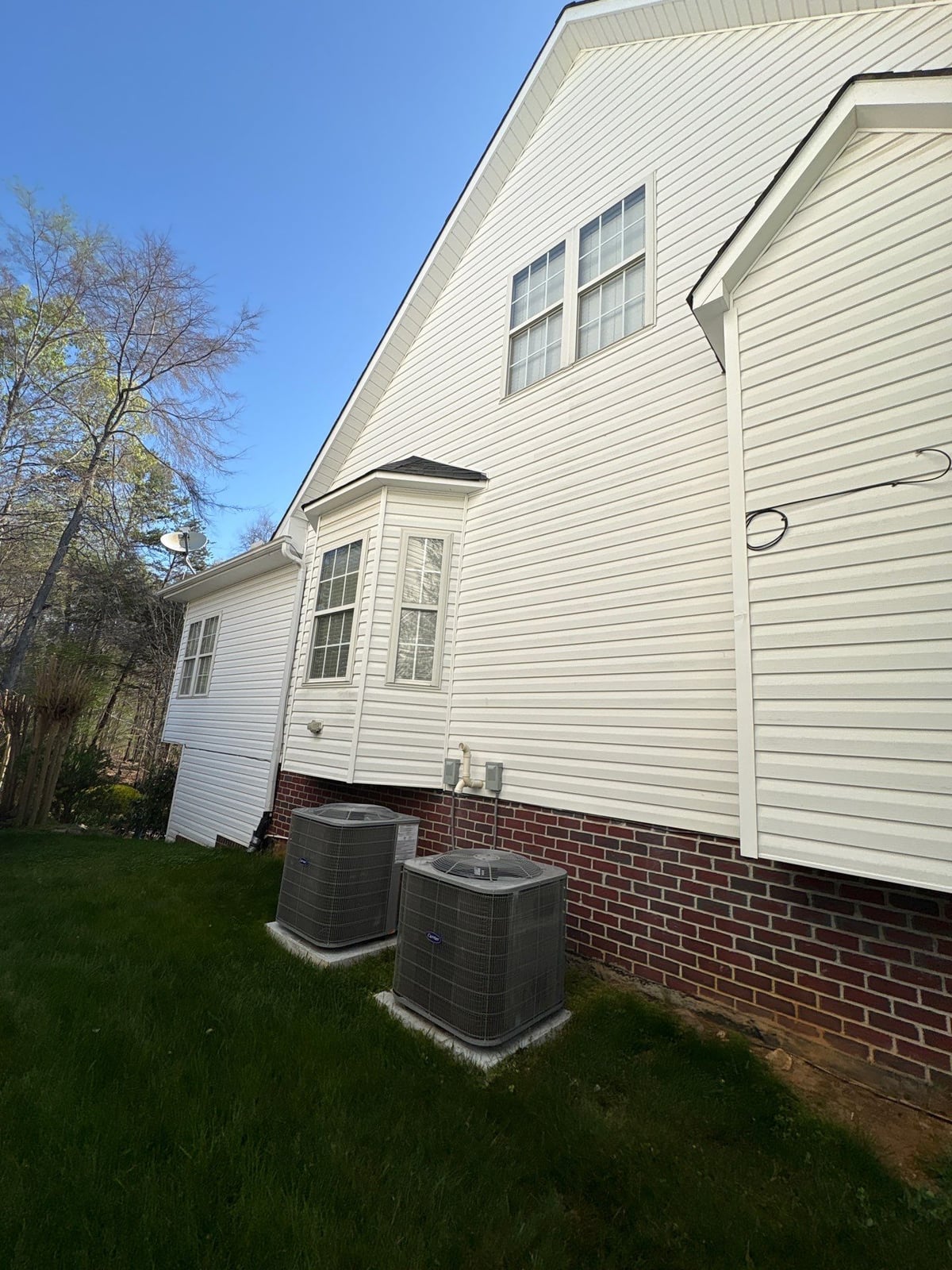 Exterior soft washing of siding and wood deck railings
