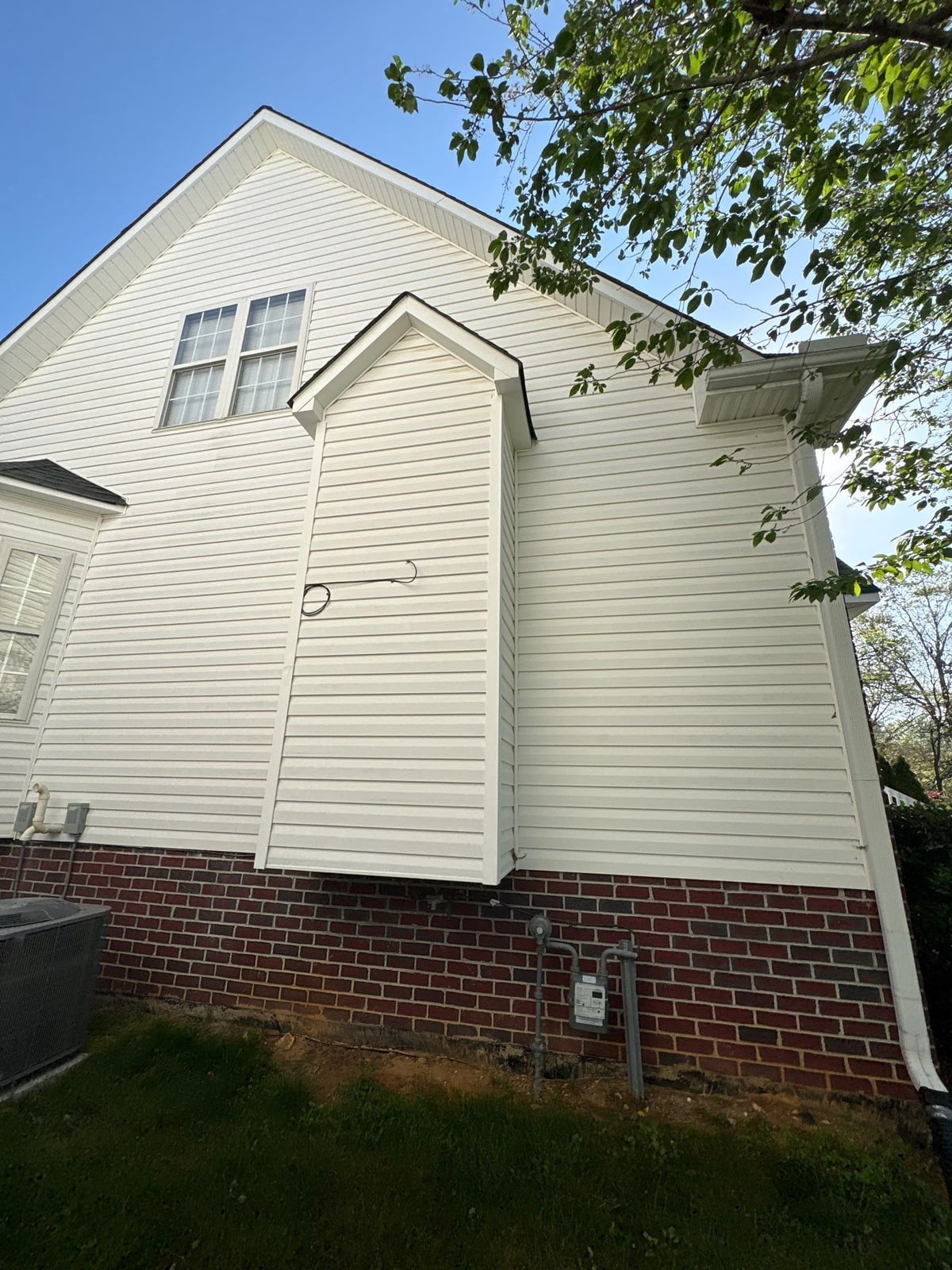 Exterior soft washing of siding and wood deck railings