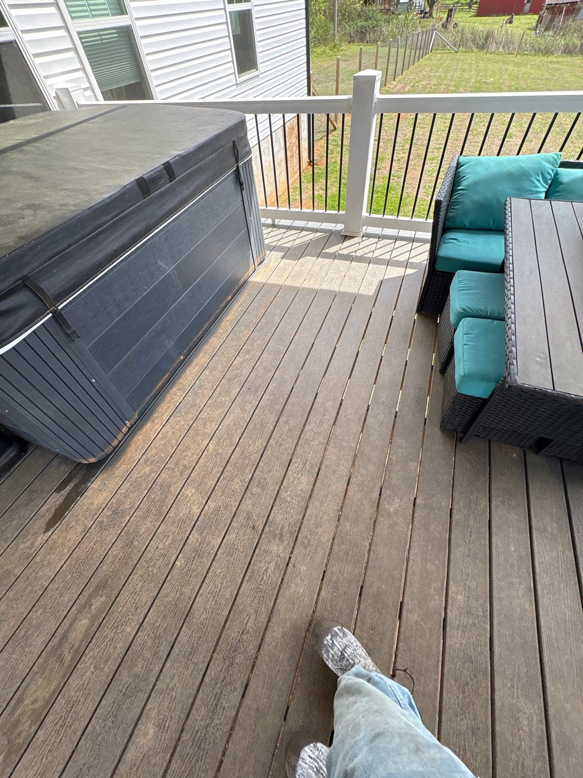 Soft washing exterior siding and porch surfaces