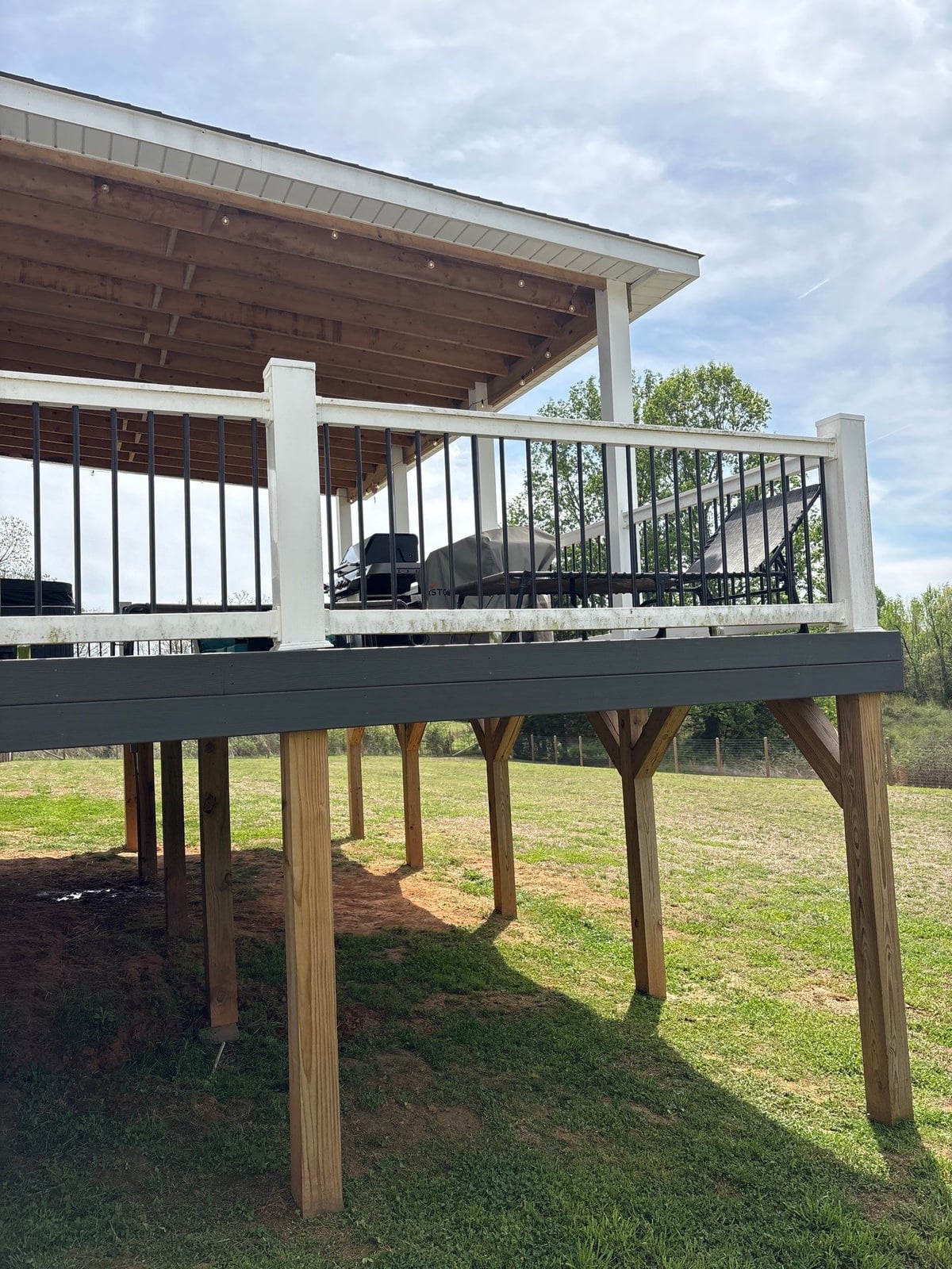 Soft washing exterior siding and porch surfaces