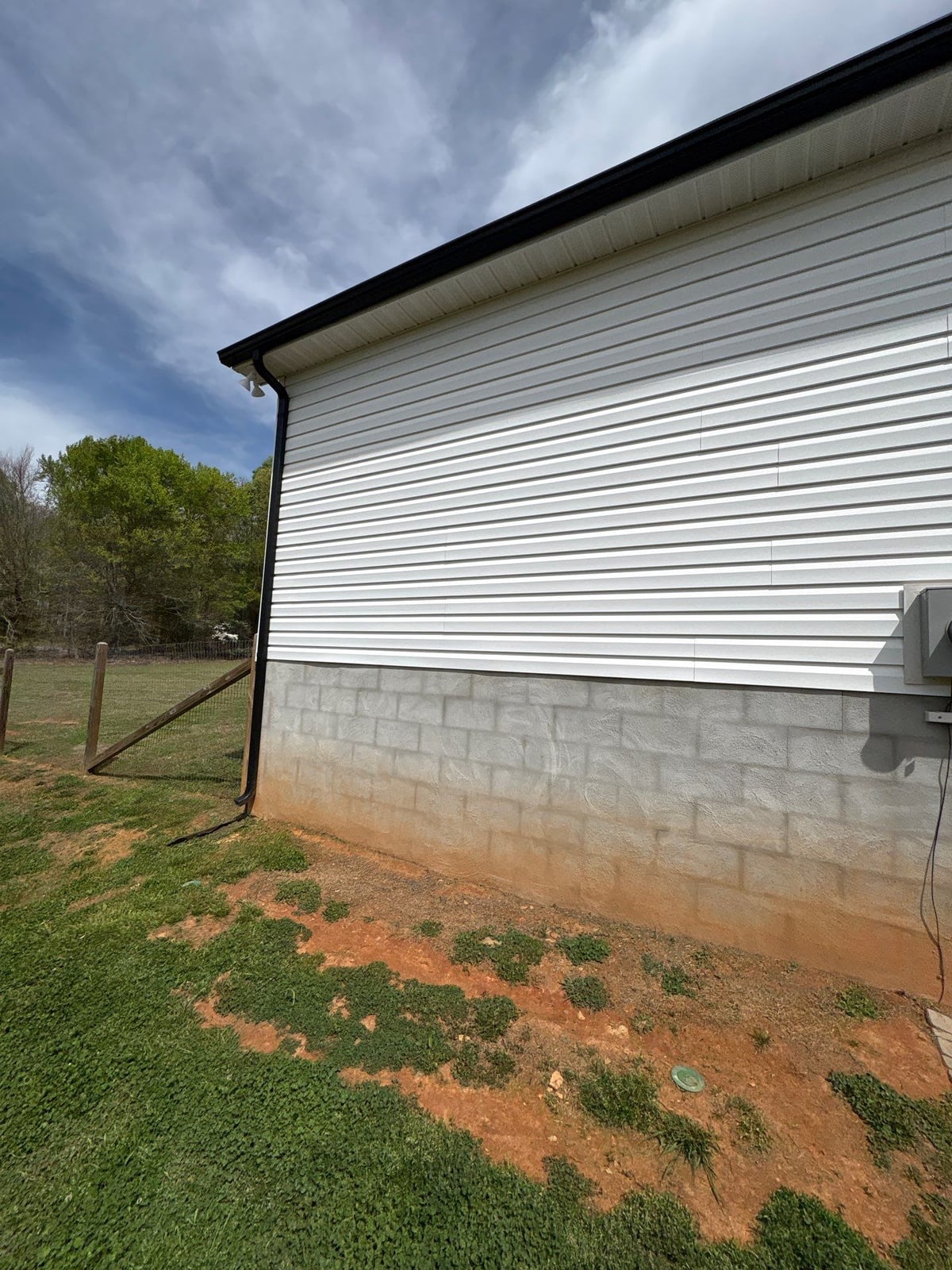 Soft washing exterior siding and porch surfaces