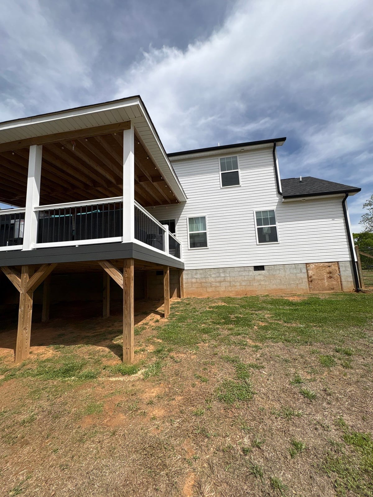 Soft washing exterior siding and porch surfaces