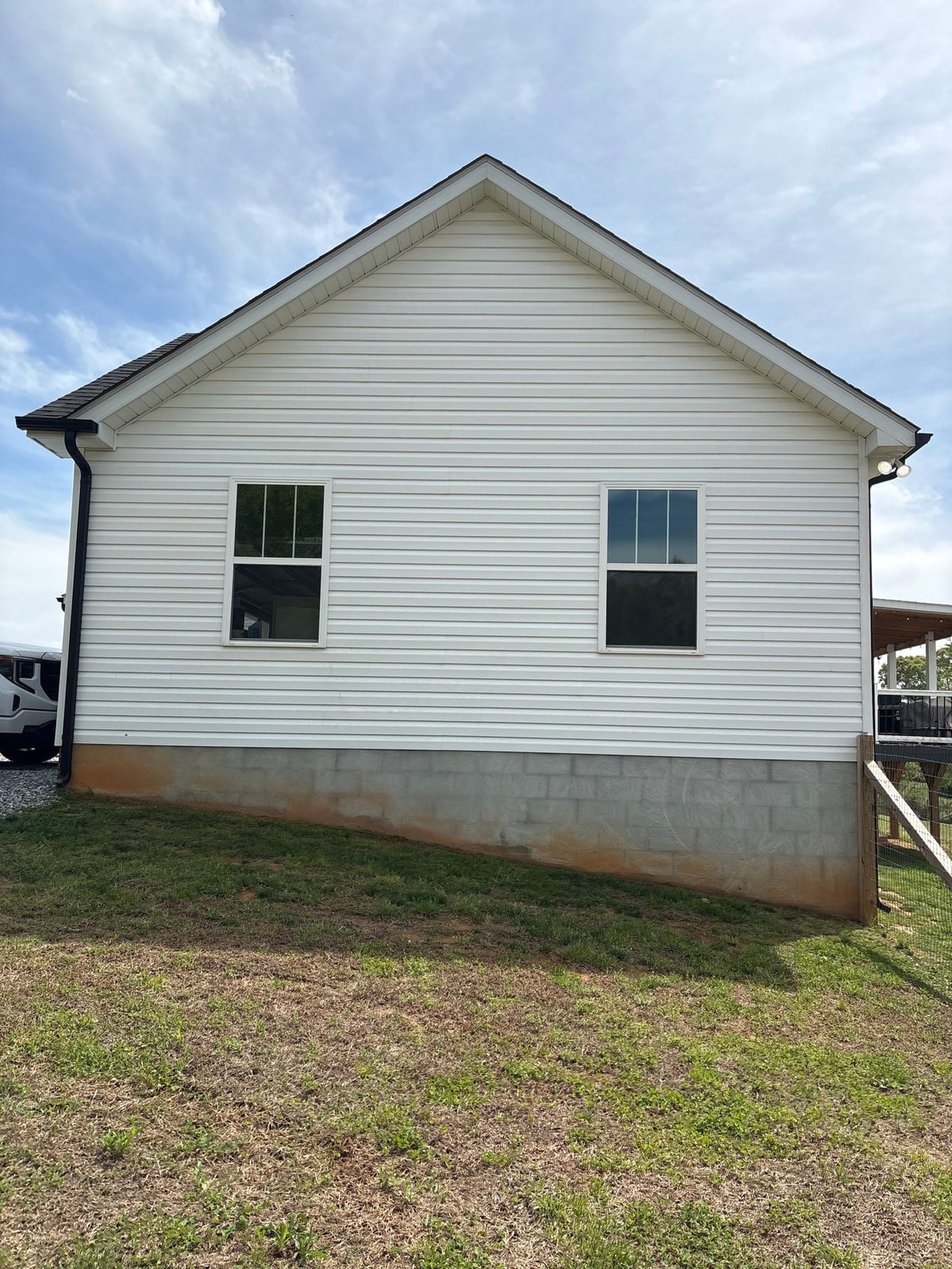 Soft washing exterior siding and porch surfaces