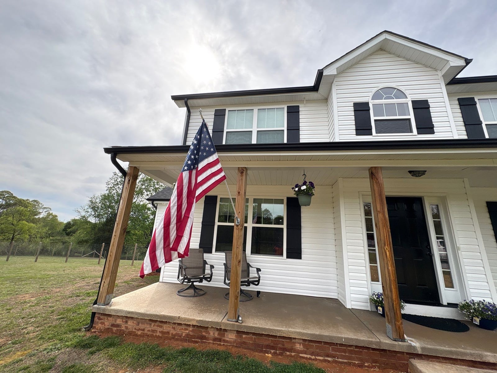 Soft washing exterior siding and porch surfaces