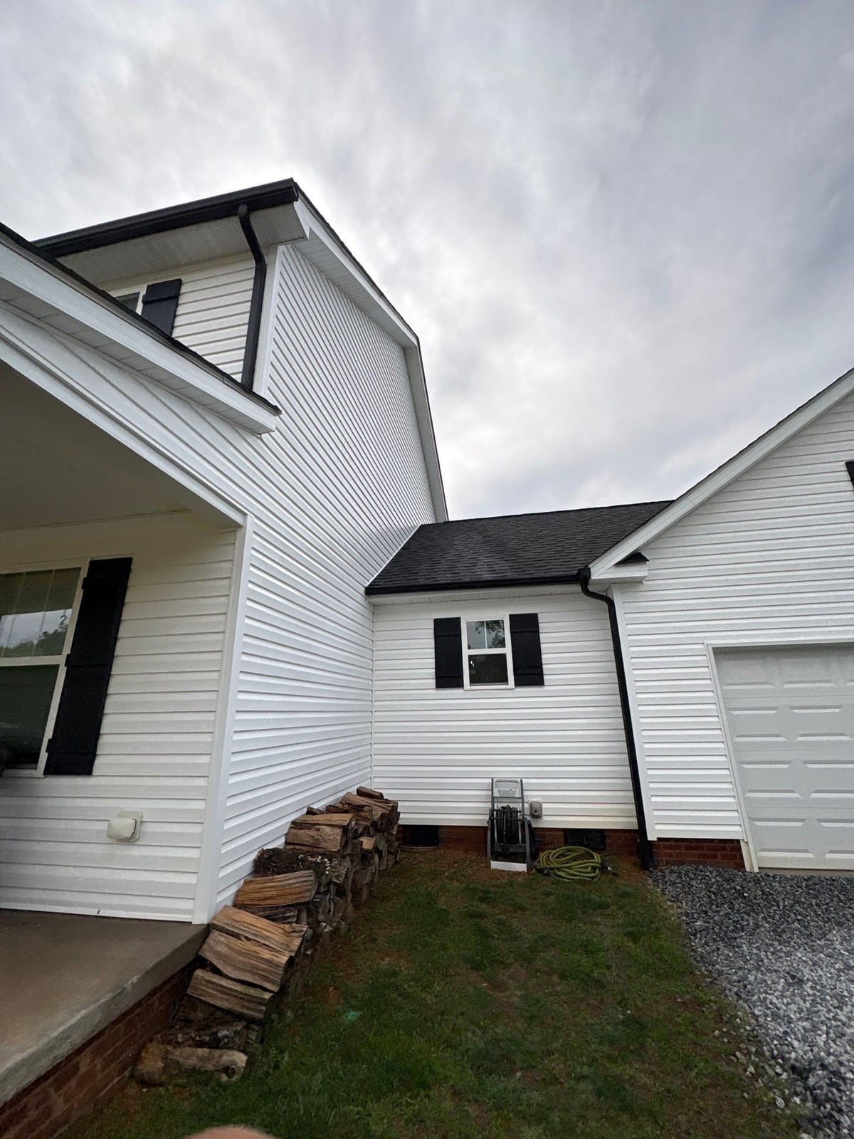 Soft washing exterior siding and porch surfaces