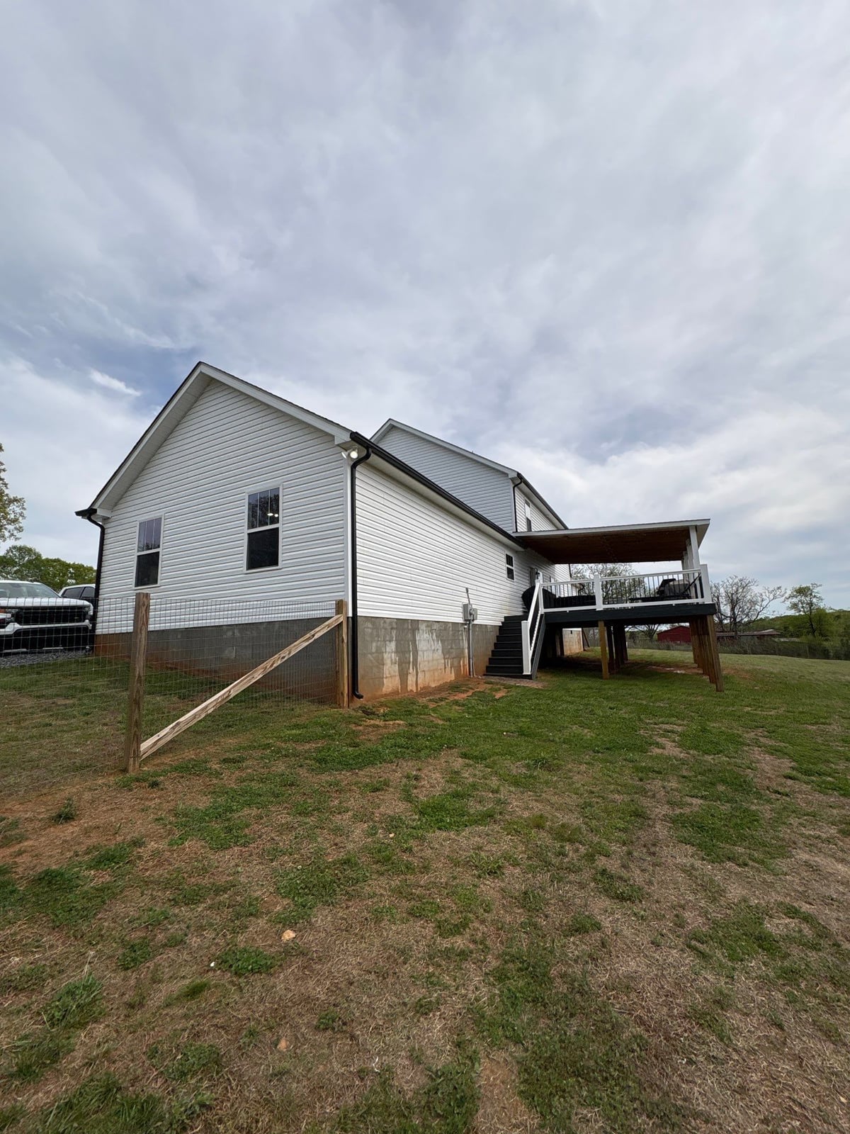 Soft washing exterior siding and porch surfaces