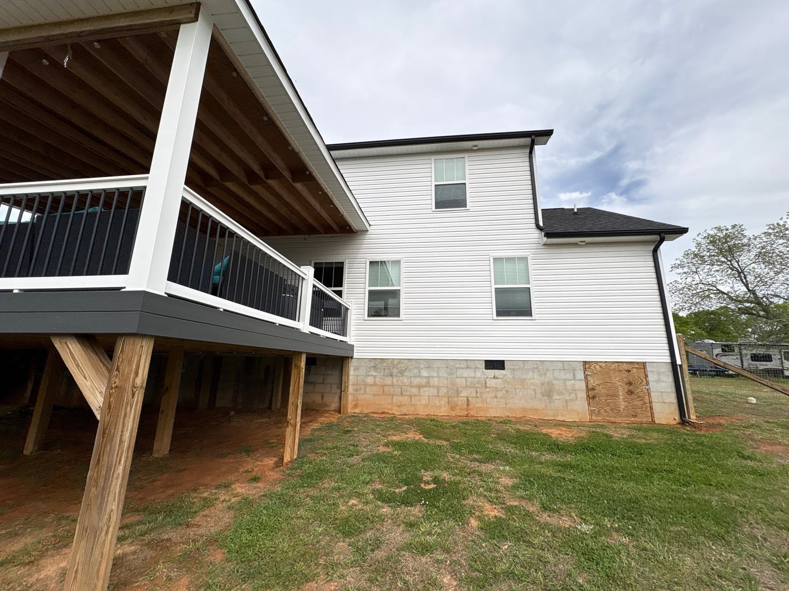 Soft washing exterior siding and porch surfaces