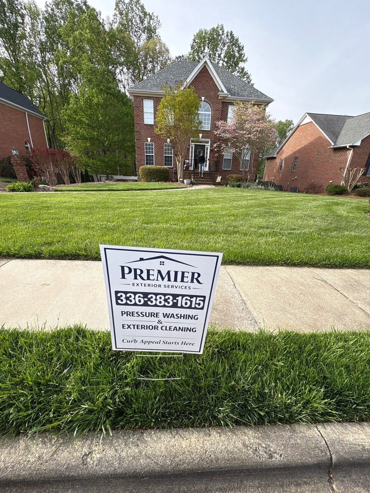Driveway pressure washing and cleaning of concrete surfaces