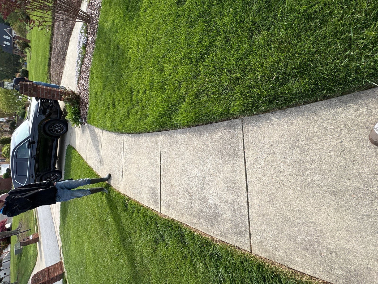 Driveway pressure washing and cleaning of concrete surfaces