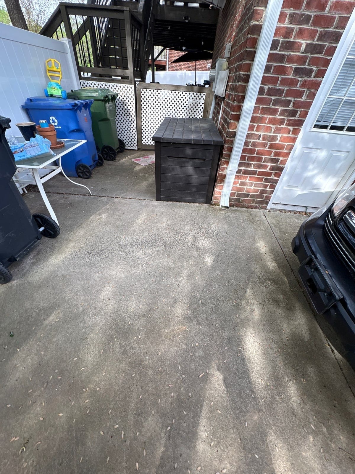 Driveway pressure washing and cleaning of concrete surfaces