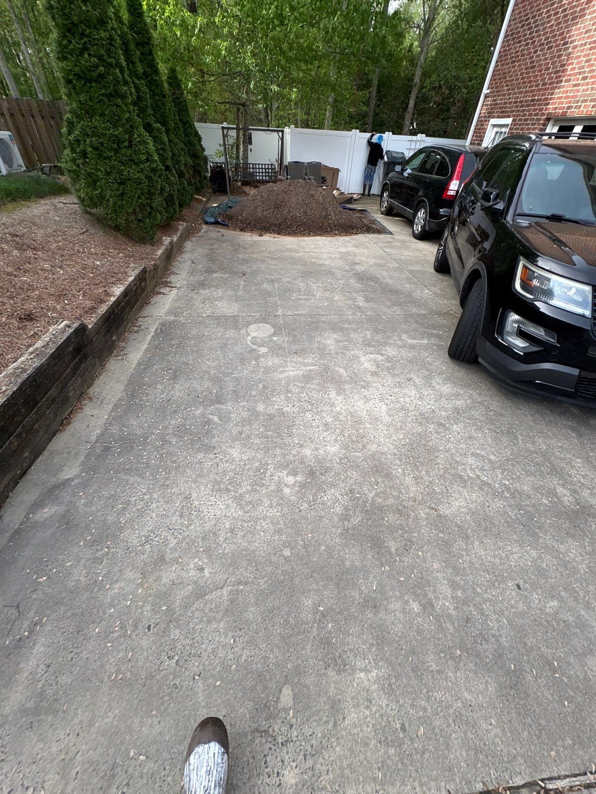 Driveway pressure washing and cleaning of concrete surfaces
