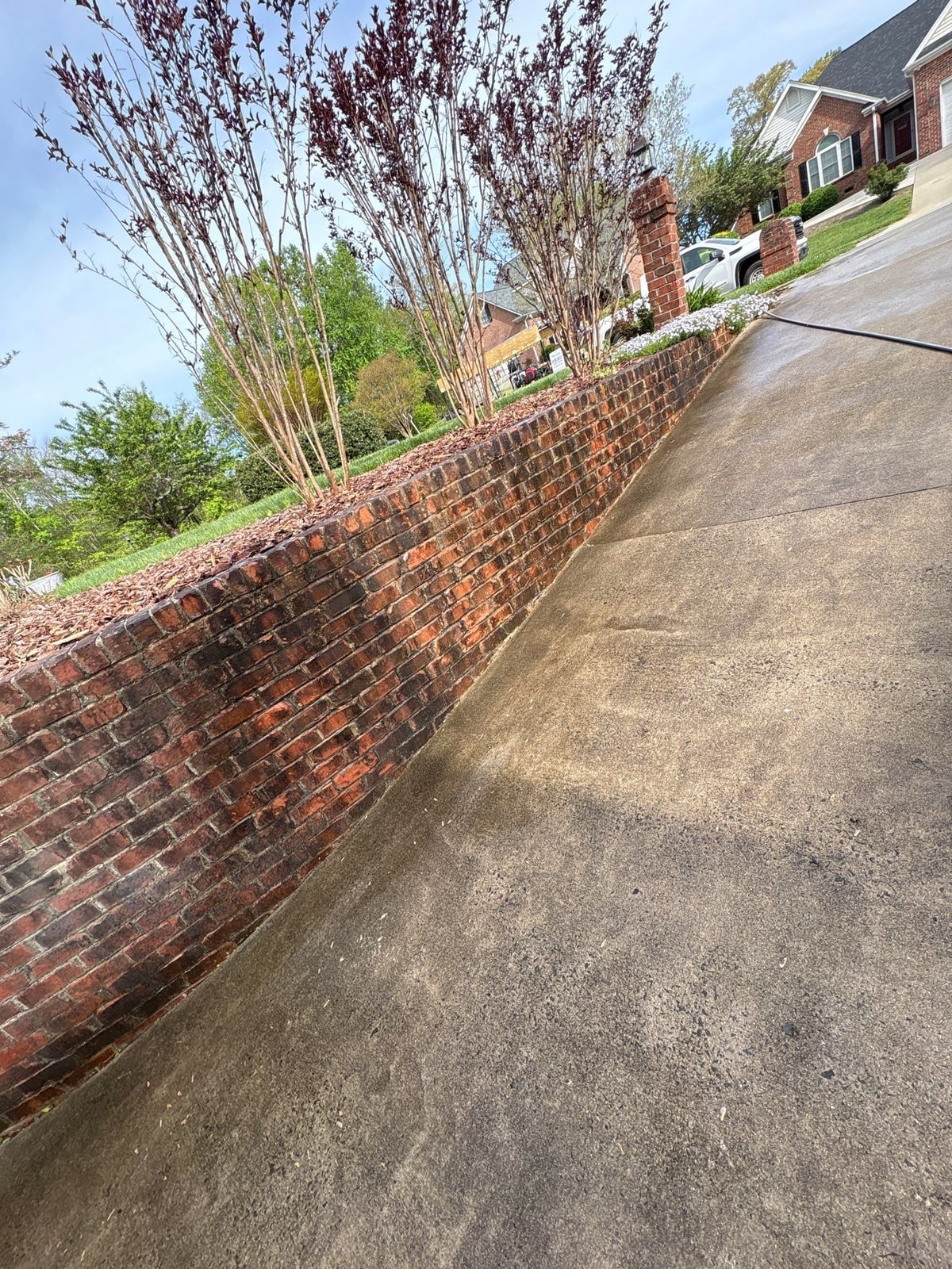 Driveway pressure washing and cleaning of concrete surfaces