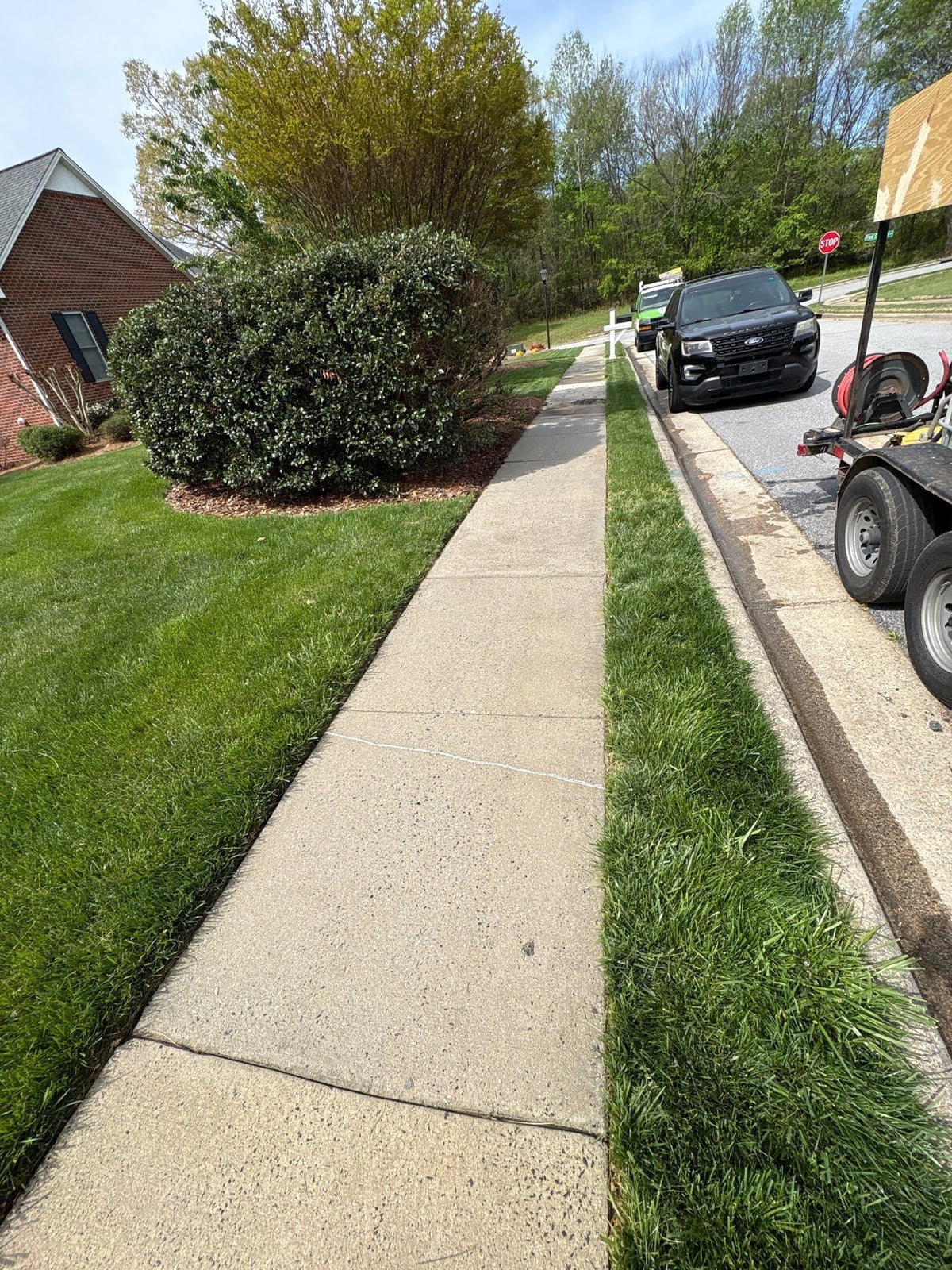 Driveway pressure washing and cleaning of concrete surfaces