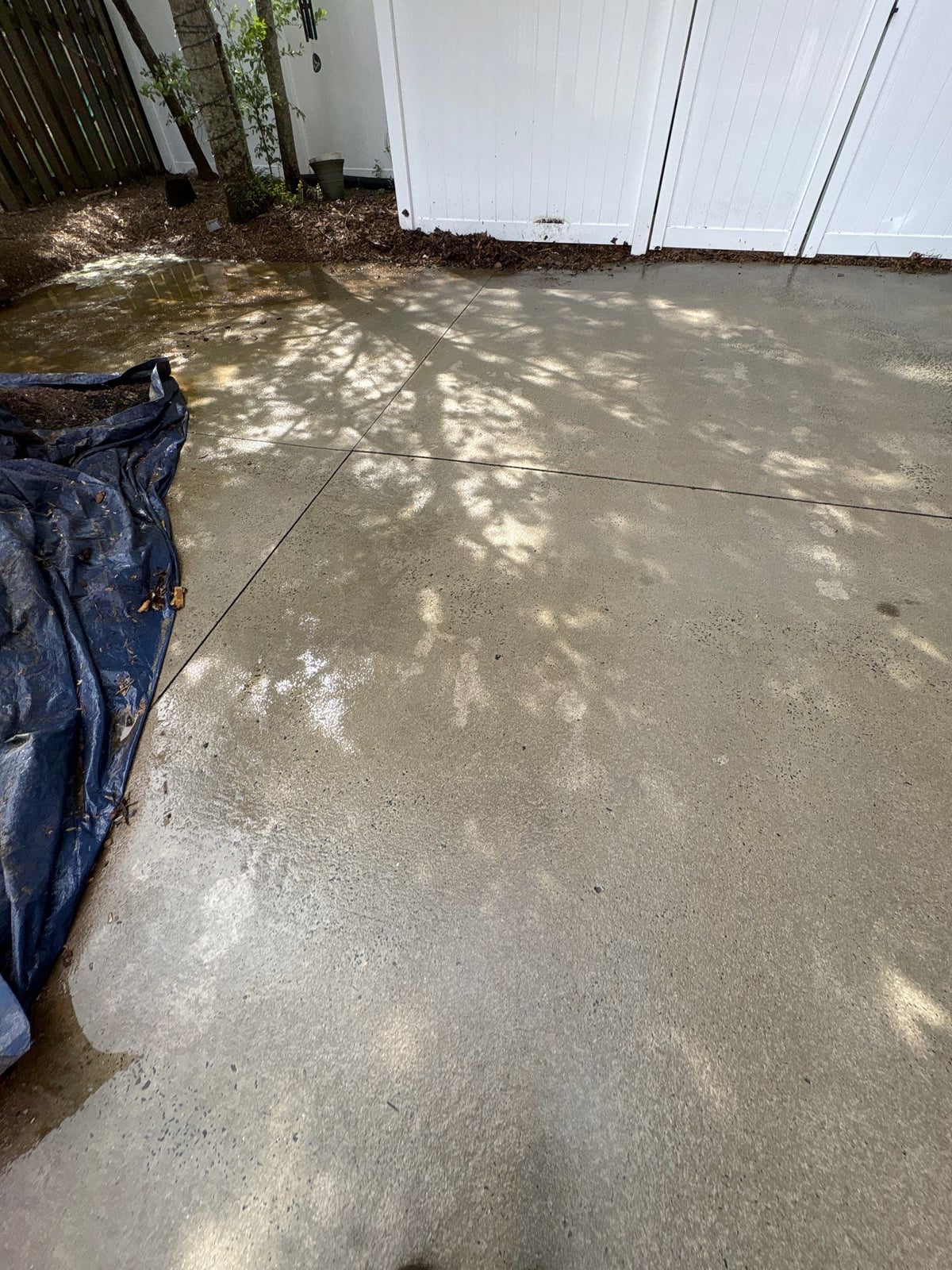 Driveway pressure washing and cleaning of concrete surfaces