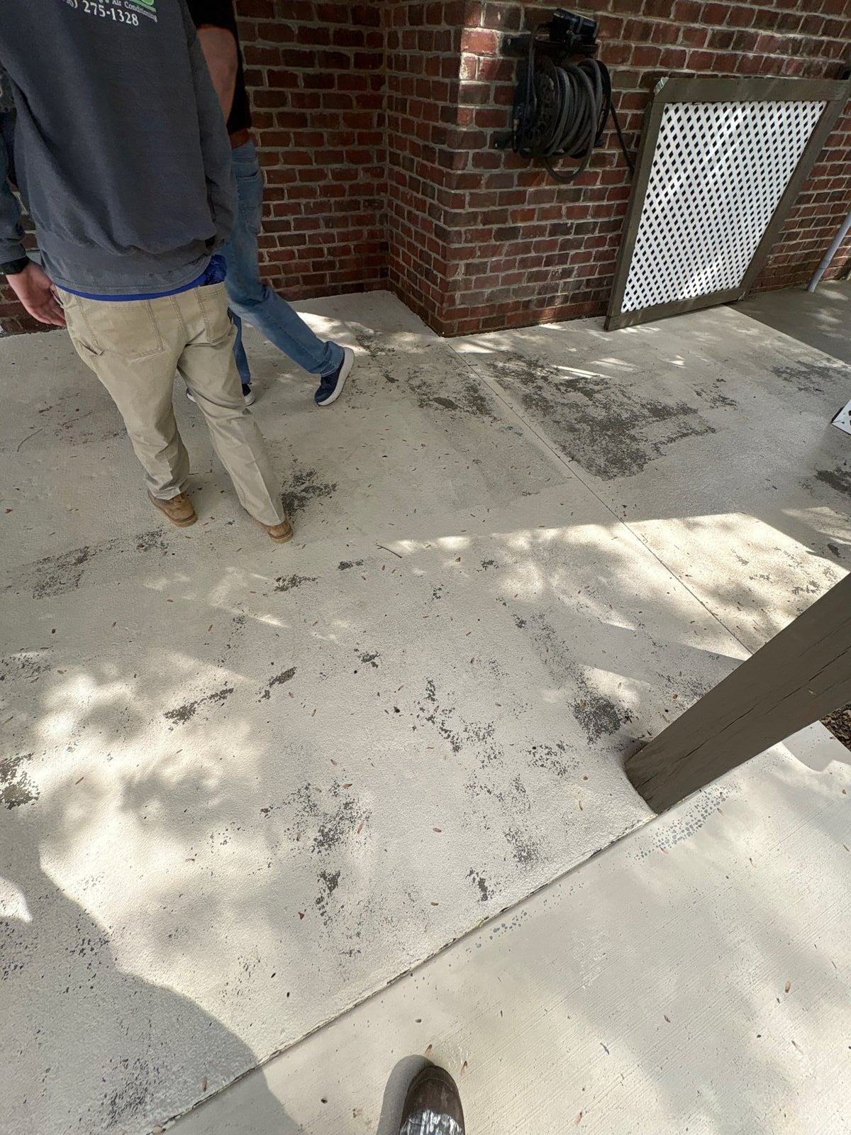 Driveway pressure washing and cleaning of concrete surfaces