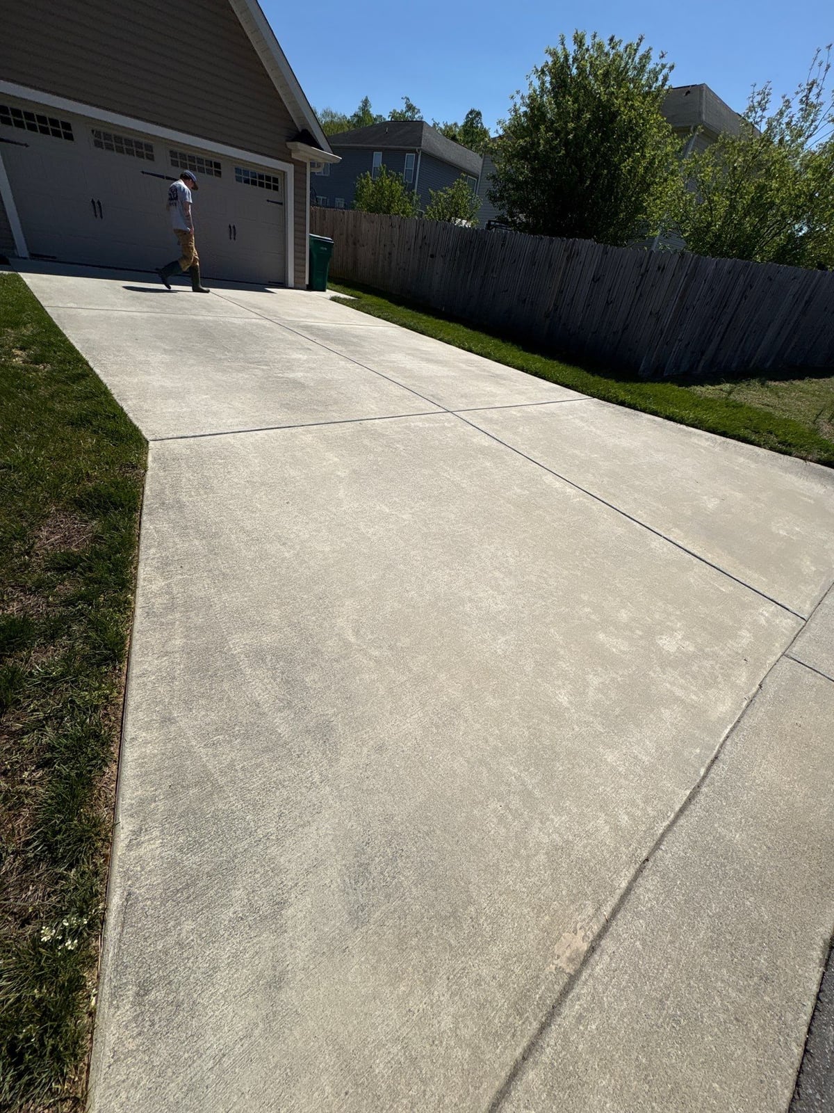 Driveway pressure washing and concrete surface cleaning