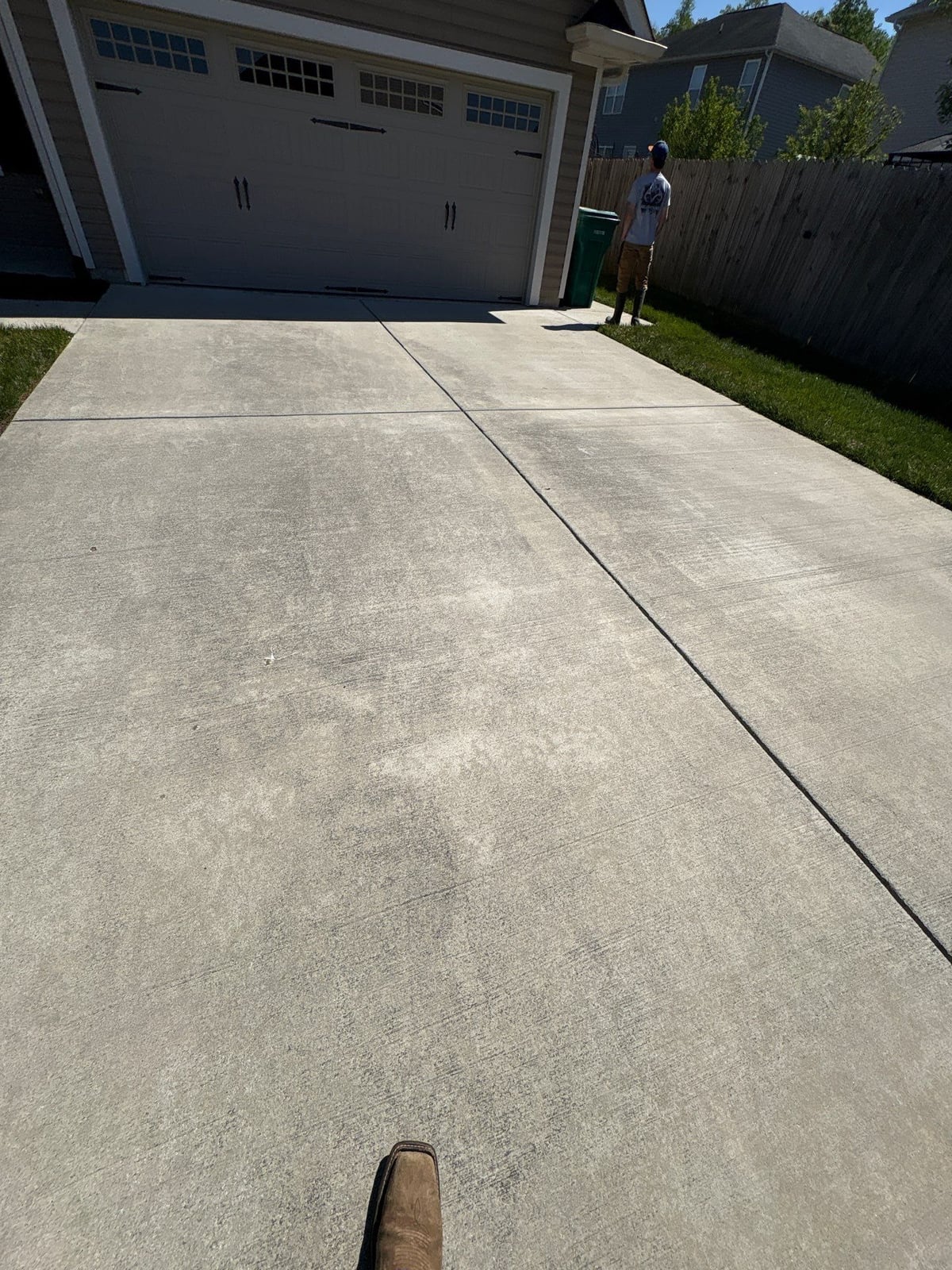 Driveway pressure washing and concrete surface cleaning