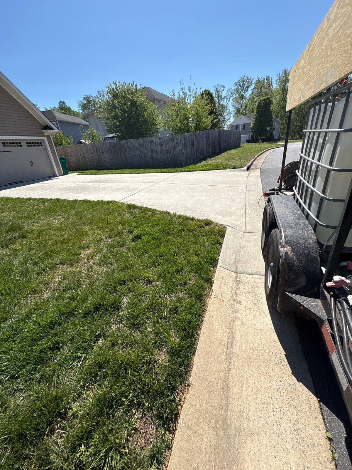 Driveway pressure washing and concrete surface cleaning