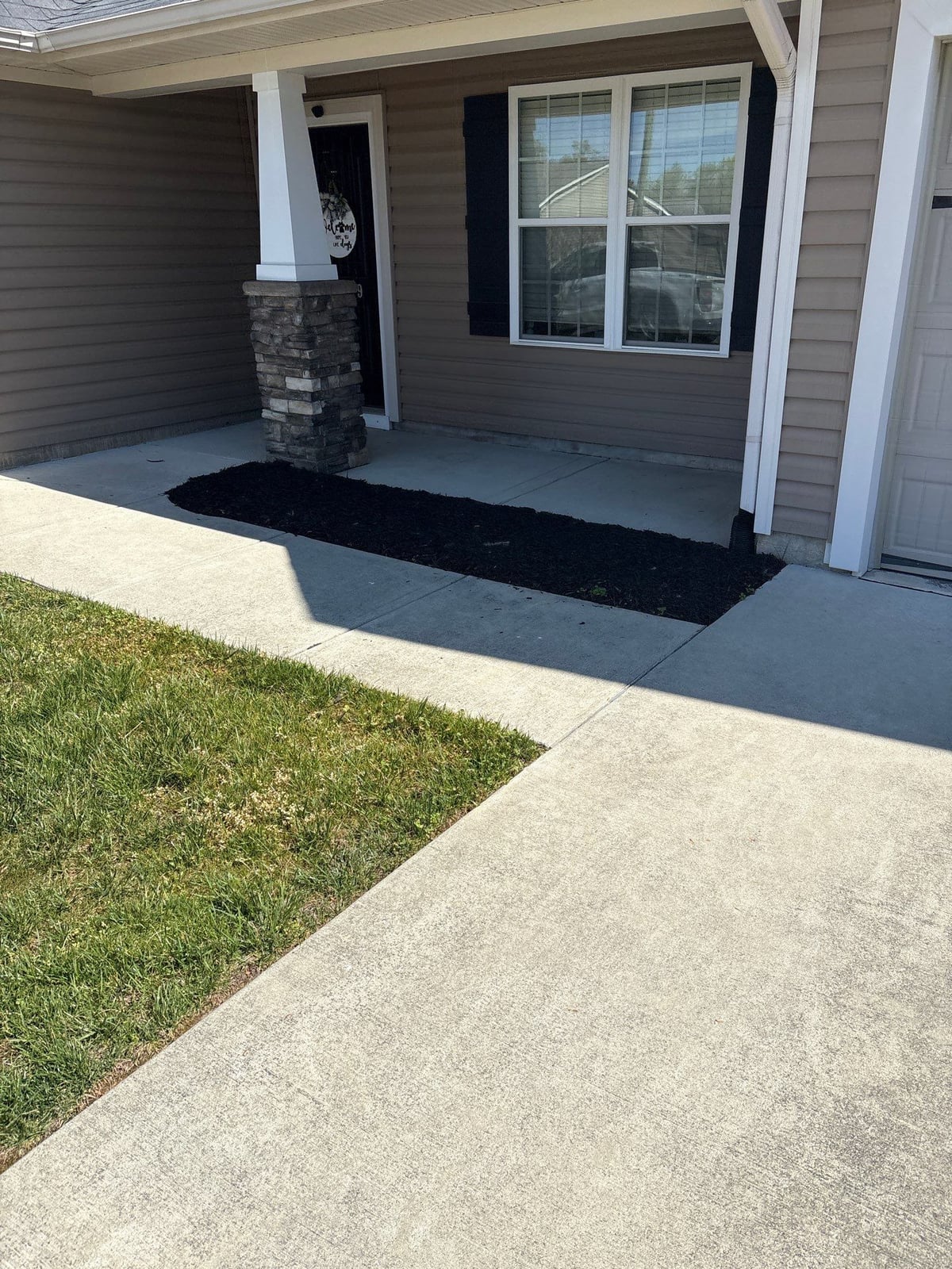 Driveway pressure washing and concrete surface cleaning