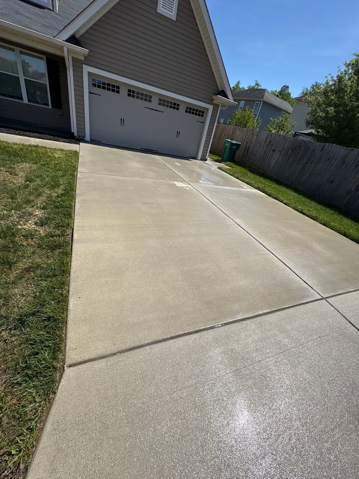 Driveway pressure washing and concrete surface cleaning