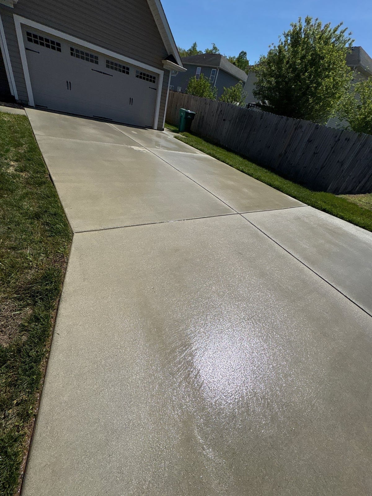 Driveway pressure washing and concrete surface cleaning