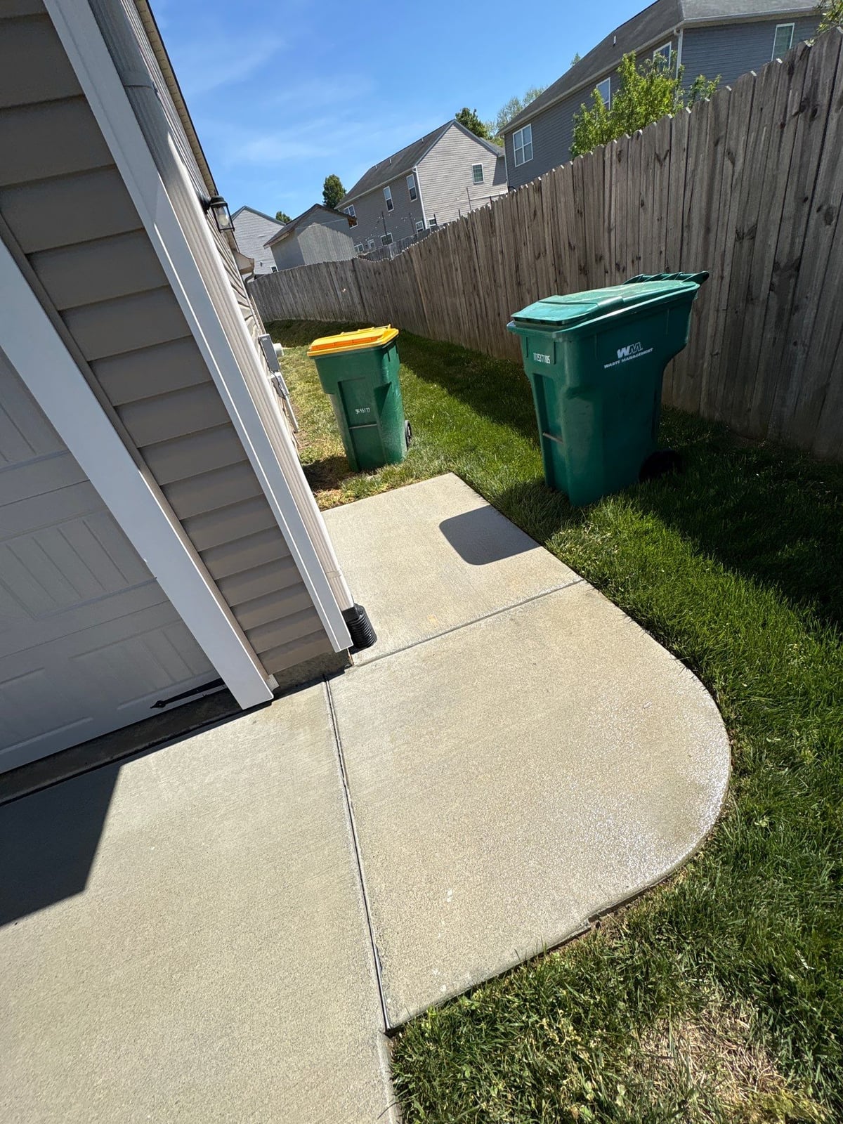 Driveway pressure washing and concrete surface cleaning