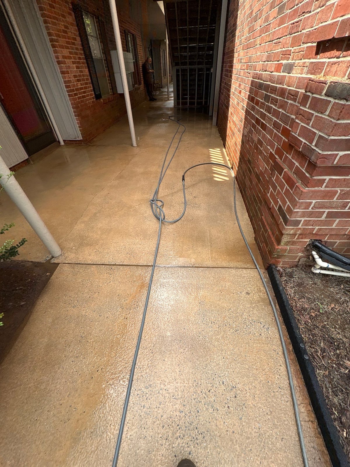 Concrete walkway power washing and exterior surface cleaning