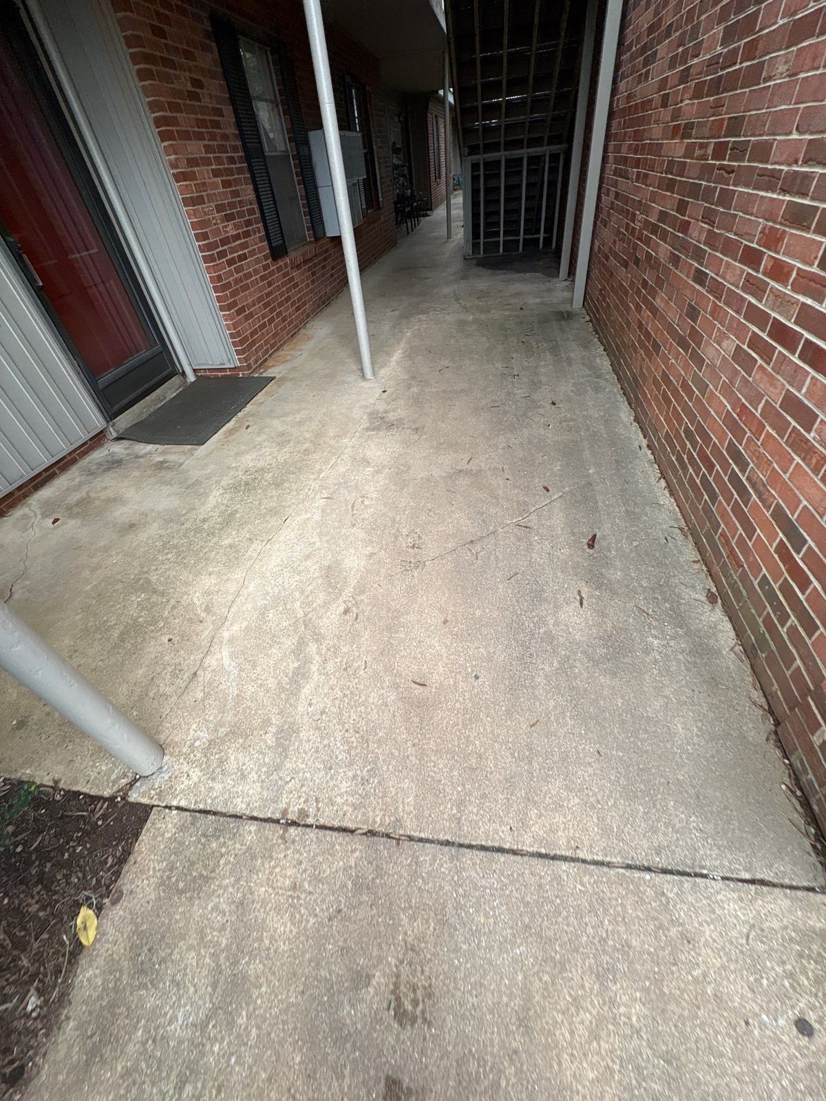Concrete walkway power washing and exterior surface cleaning