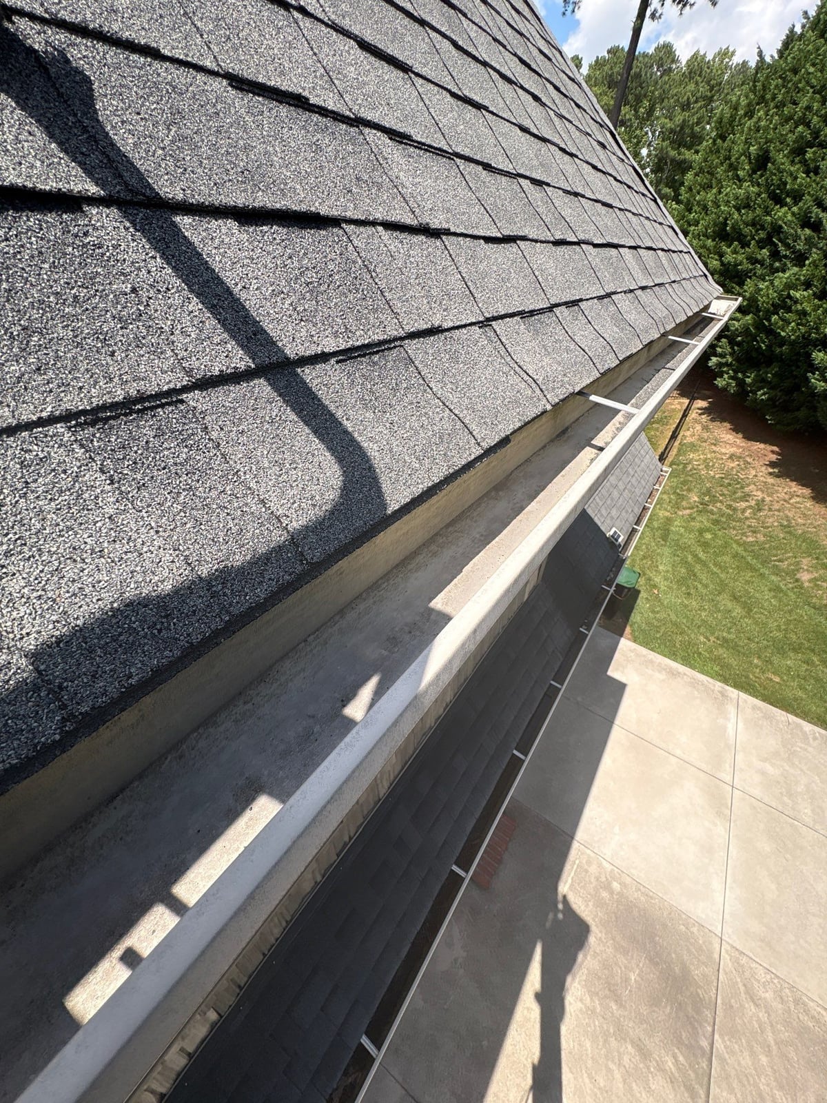 Residential roof gutter cleaning and debris removal